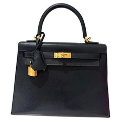Hermes Kelly 25 black with gold hardware handbag