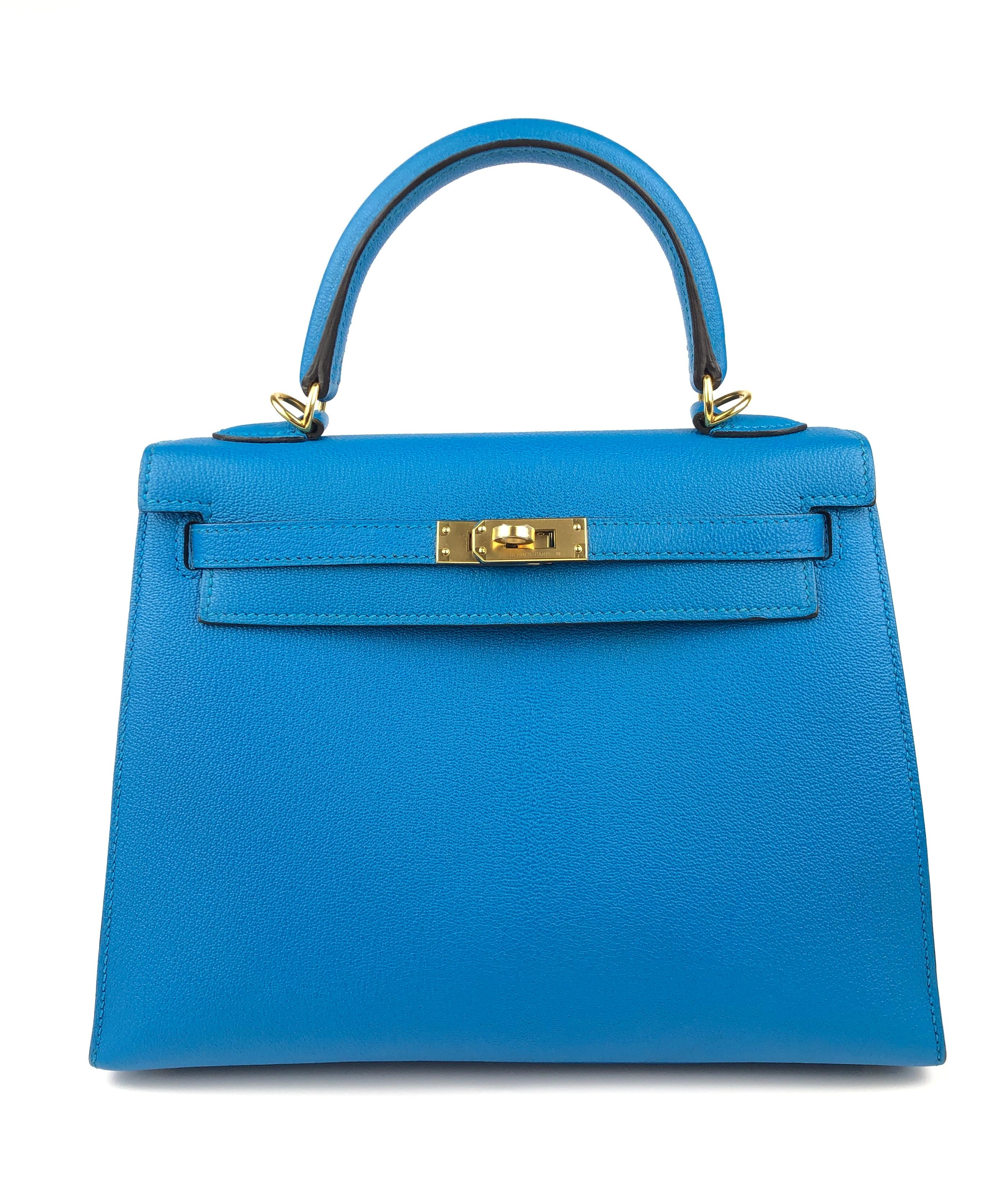 Stunning Pristine almost As New Hermes Kelly 25 Sellier Blue Zanzibar Chèvre Leather complimented as Gold Hardware. 2017 A Stamp. Plastic on all hardware and feet. 

Shop with Confidence from Lux Addicts. Authenticity Guaranteed! 