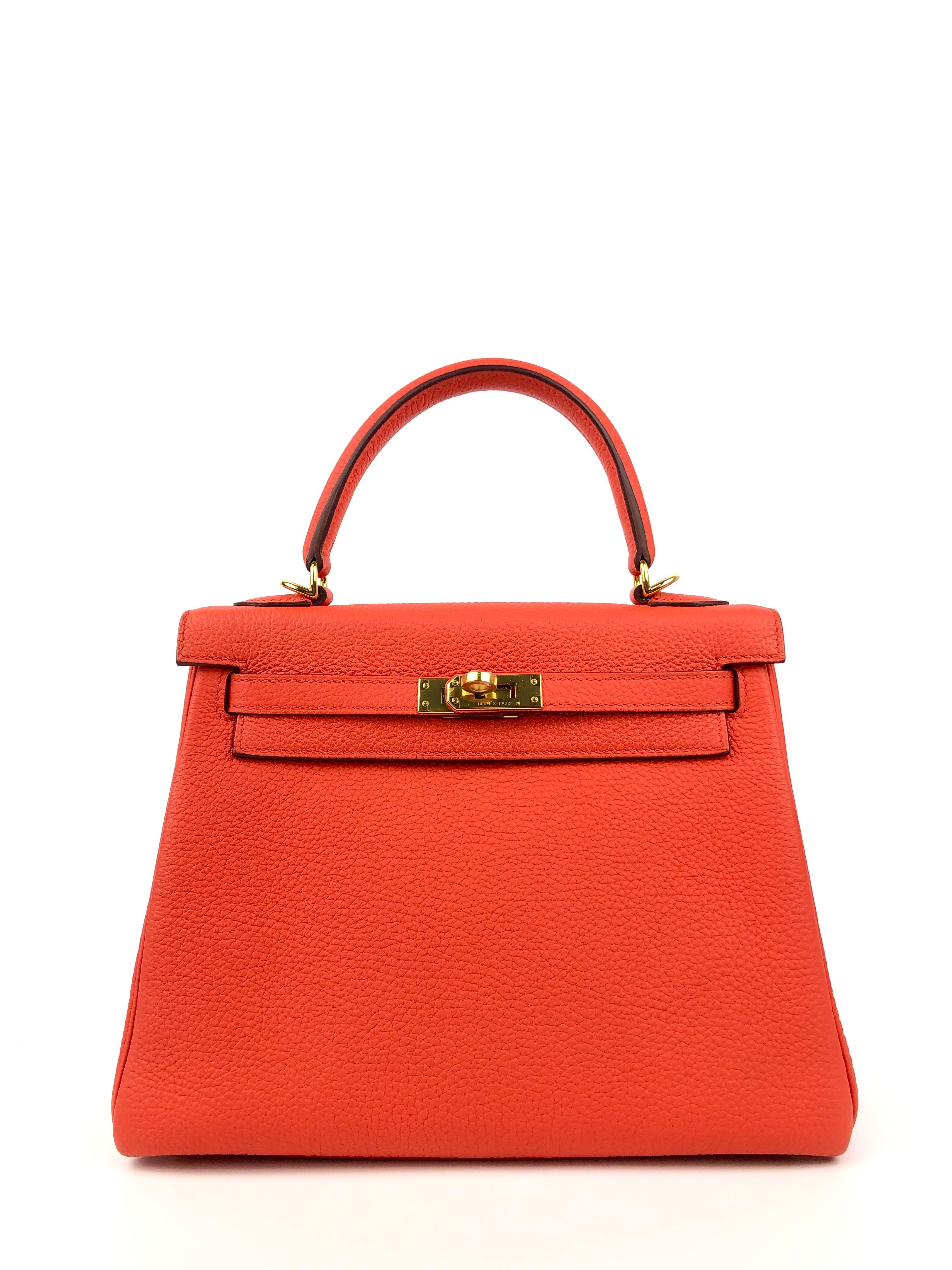 Hermes Kelly 25 Capucine Orange Red Gold Hardware. 2017 A STAMP. Pristine Condition, Plastic on Hardware perfect corners and structure. 

Shop with confidence from Lux Addicts. Authenticity Guaranteed!