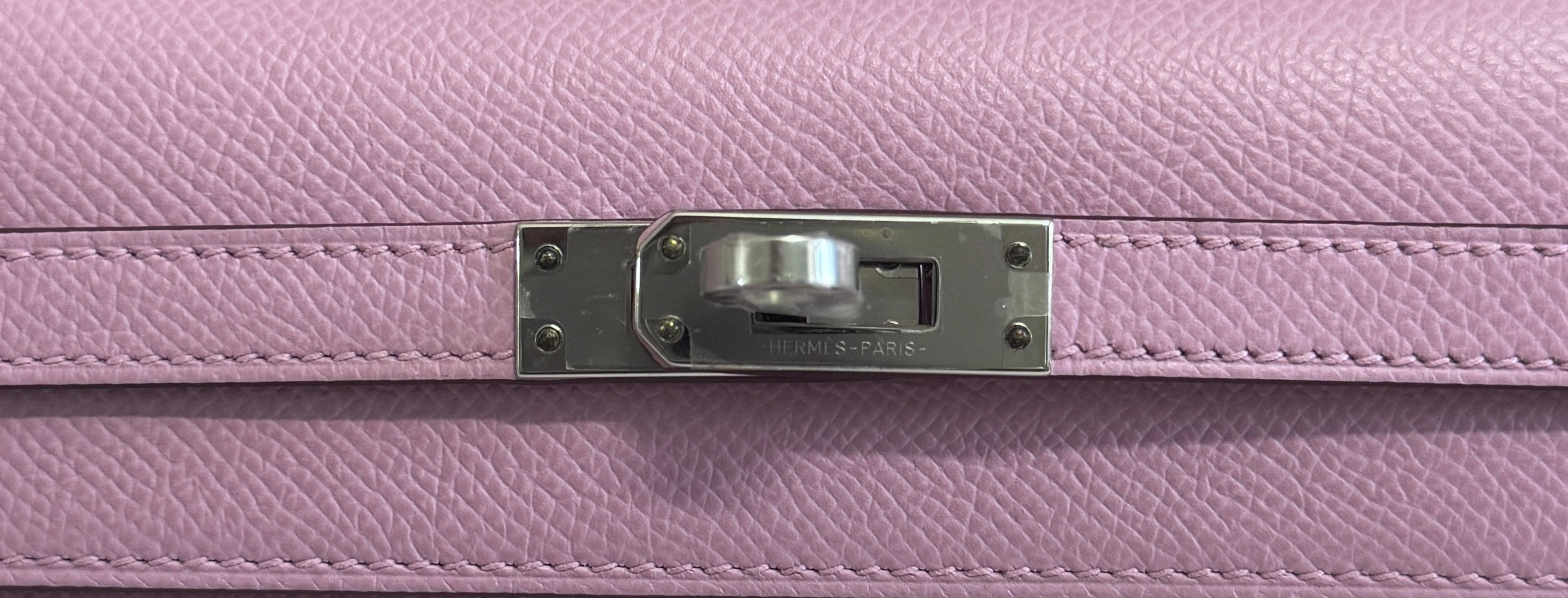 As New RARE Most Coveted Hermes Kelly 25 Sellier Mauve Sylvester Epsom Leather , Complimented by Palladium Hardware. AS NEW Z STAMP 2021.

Shop with confidence from Lux Addicts. Authenticity Guaranteed!