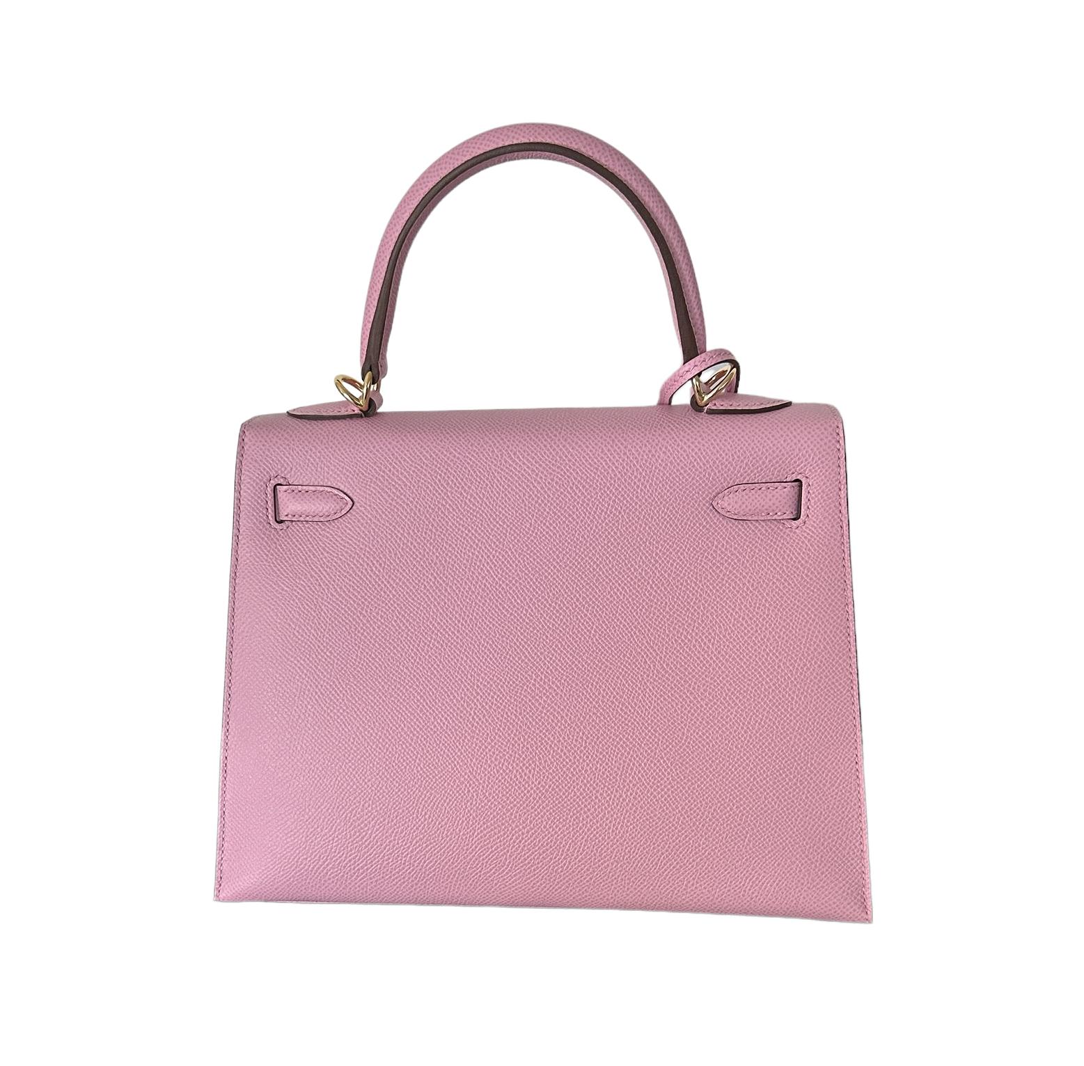 Hermes
Kelly 25cm Sellier
Mauve Sylvestre with Lime Interior
Special VIP Order, with Horseshoe Stamp
Epsom leather
Mauve Sylvestre exterior
Lime interior
Top handle with removable shoulder strap
Perma Brass Hardware, which actually looks almost rose