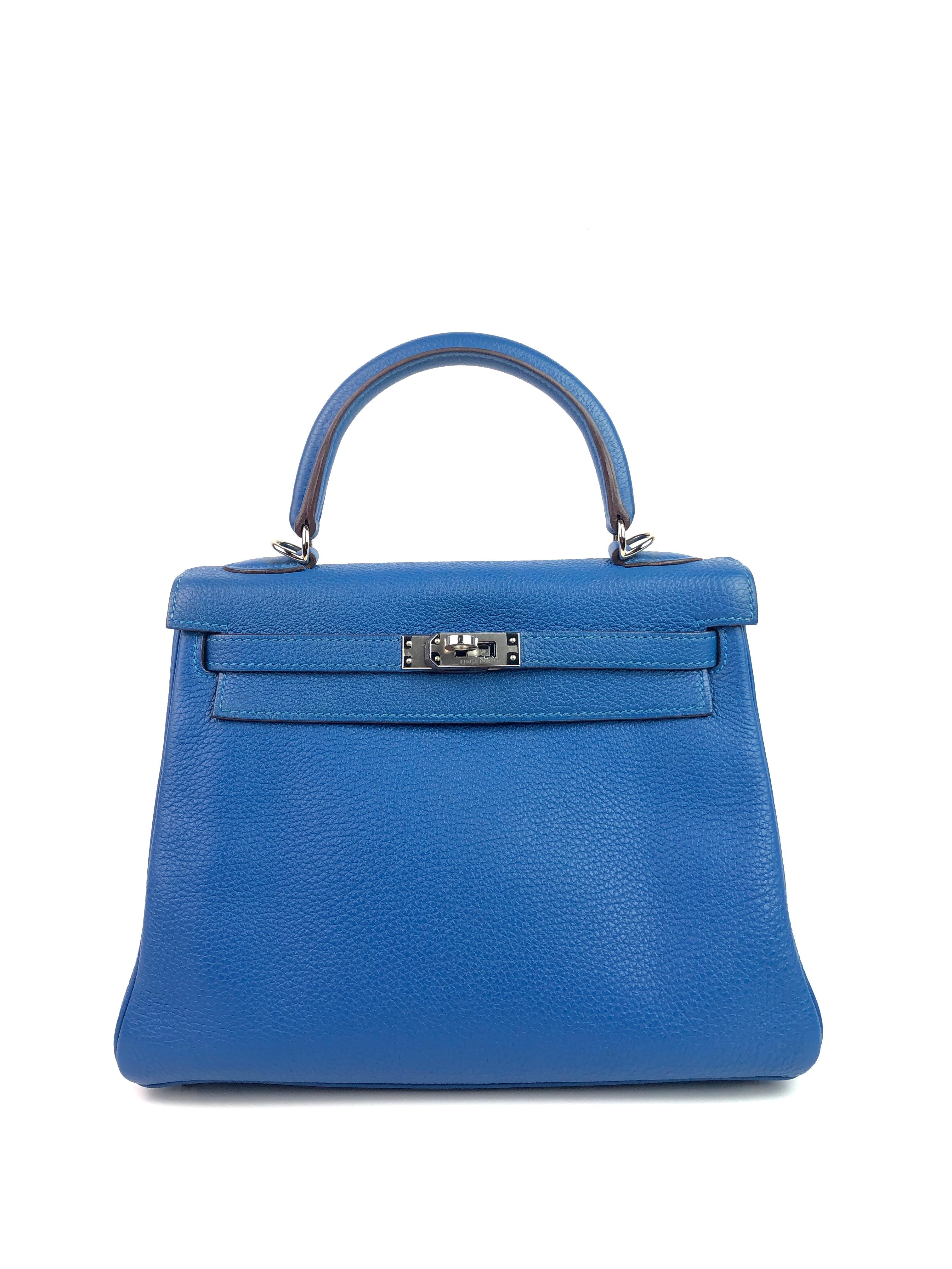 Hermes Kelly 25 Mykonos Blue Togo Palladium Hardware. Excellent Pristine Condition with Plastic on Hardware. Excellent corners and structure. 
Shop with Confidence from Lux Addicts. Authenticity Guaranteed!