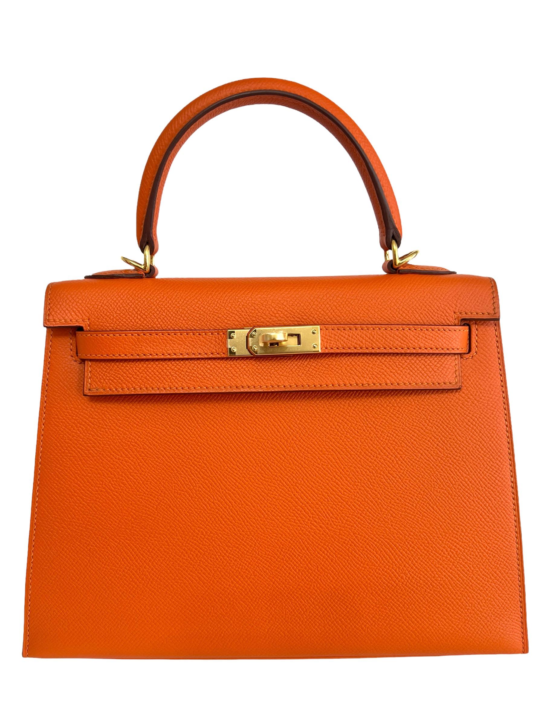 Beautiful Hermes Kelly 25 Sellier Orange Epsom Leather. Complimented by Gold Hardware. Pristine Almost Like New with Plastic on all Hardware and feet. 2015 T Stamp. 

Shop with Confidence from Lux. Addicts. Authenticity Guaranteed! 
