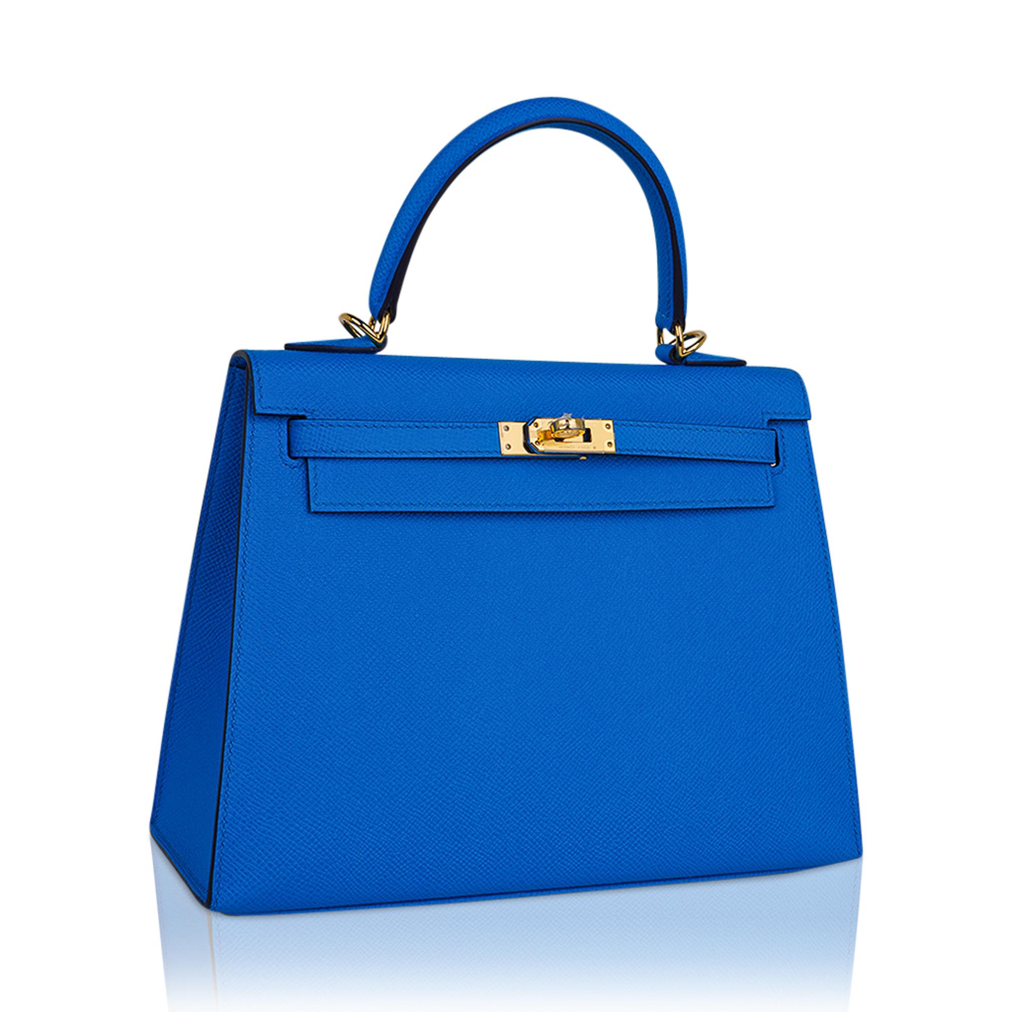 Mightychic offers an exquisite Hermes Kelly 25 Sellier bag featured in richly saturated Bleu Frida.
This exotic Hermes Kelly bag colour is a beautiful year round neutral.
Accentuated with gold hardware and epsom leather.
Comes with signature Hermes
