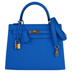 Sac Hermès Kelly 25 Sellier bleu Frida en cuir Epsom finitions métalliques dorées