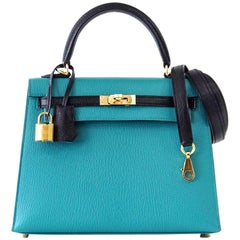 Hermès Kelly 25 Sellier Tasche HSS Blau Paon / Schwarz Chevre Mysore Gold