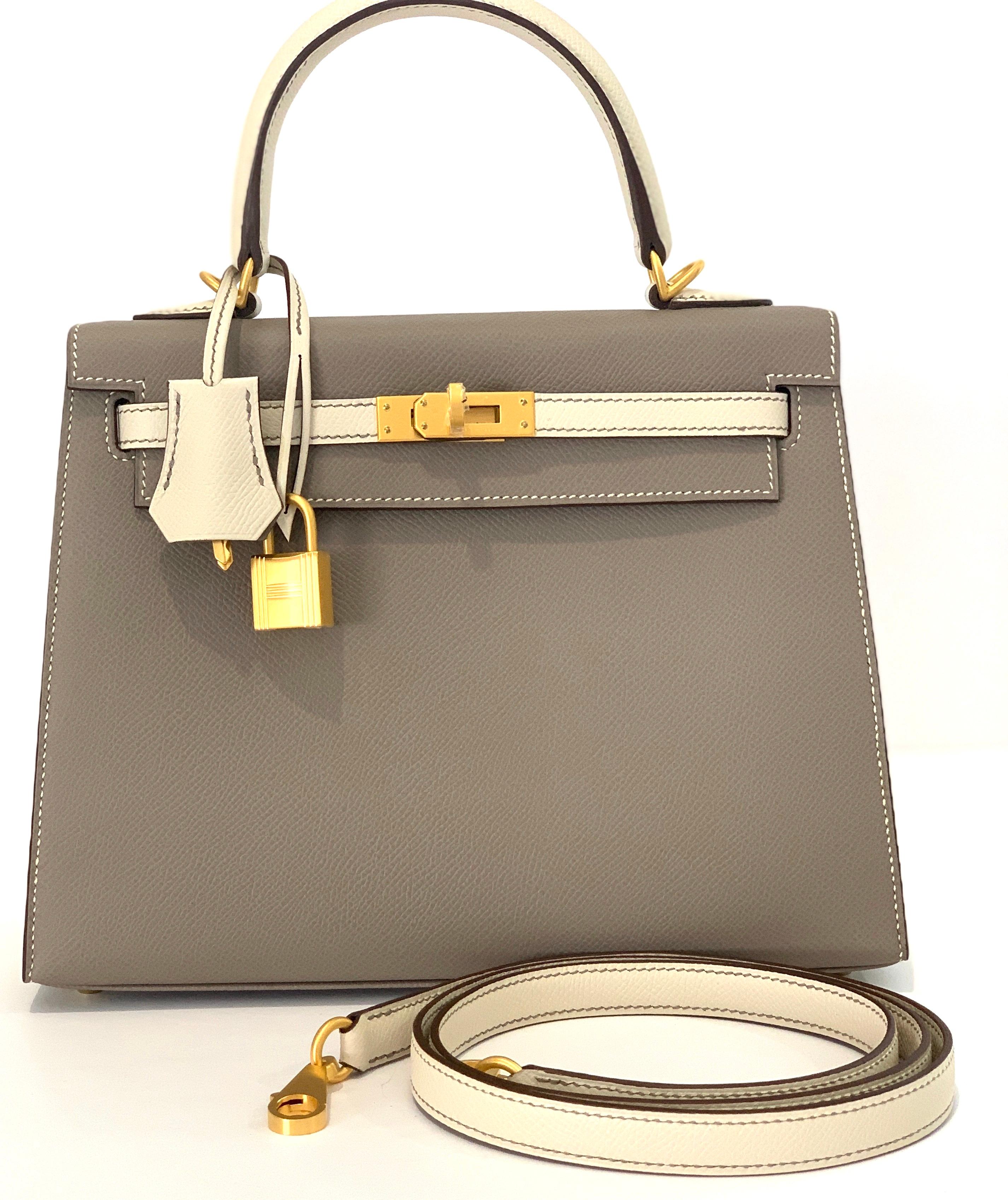Hermes 25cm Kelly
Hermes Kelly 25cm

Special order
Gris Asphalte  and Craie
Contrasting topstitching detail
Brushed Gold Hardware
A perfect neutral Kelly

Epsom sellier 
Plastic on the hardware

Accompanied by: Hermes box, Hermes dustbag, clochette,
