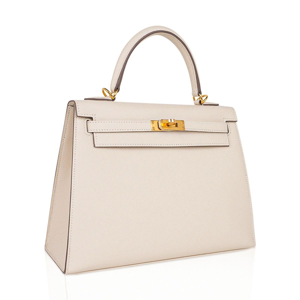 Mightychic offers an Hermes 25 Kelly Sellier bag features creamy neutral perfection - Craie.
This colour is fast becoming a unicorn and a collectors treasure!
Created in Epsom leather.
Rich with Gold hardware.  
Comes with signature Hermes box,