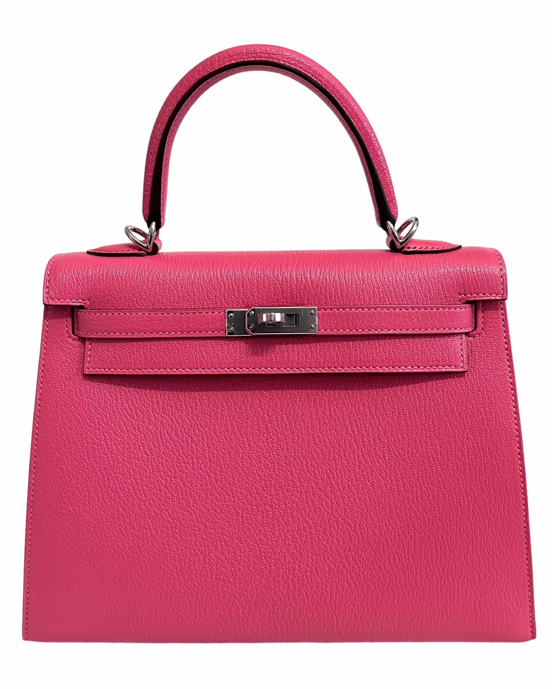 Beautiful As New 2020 Hermes Kelly 25 Sellier Rose Lipstick Chèvre Leather, Complimented by Palladium Hardware. As New with Plastic on all Hardware and feet. 2020 Y Stamp. 

Shop with Confidence from Lux. Addicts. Authenticity Guaranteed! 

Lux