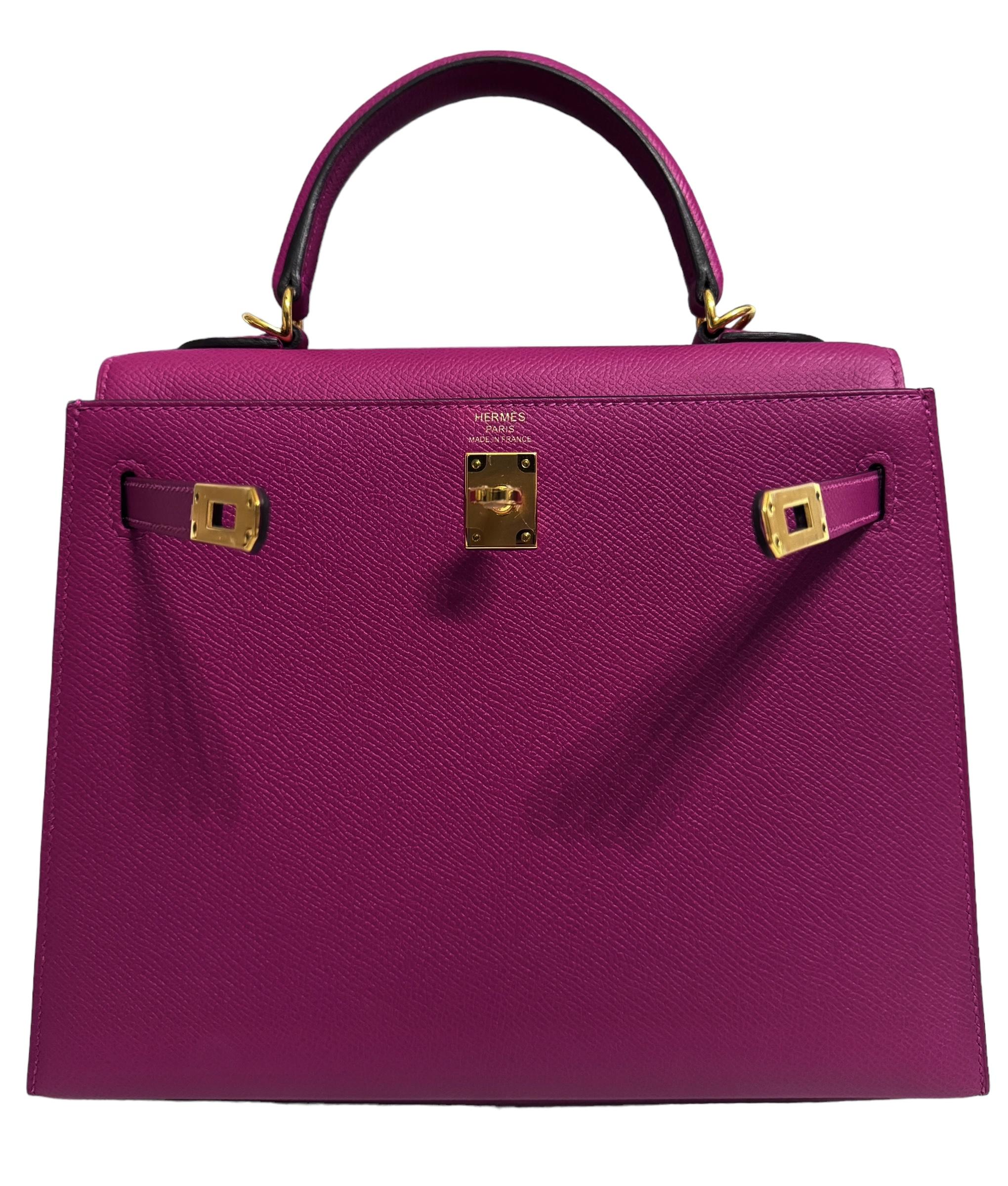 AS NEW RARE MOST WANTED Hermes Kelly 25 Sellier Rose Pourpre Epsom Leather. Complimented by Gold Hardware. As New with Plastic on all Hardware and feet. 2020 Y Stamp.
Includes all accessories and box. 

Shop with confidence from Lux Addicts.