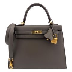Hermes Kelly 25 Sellier Mancha Gris Cuero Epsom Herrajes de Oro Raro