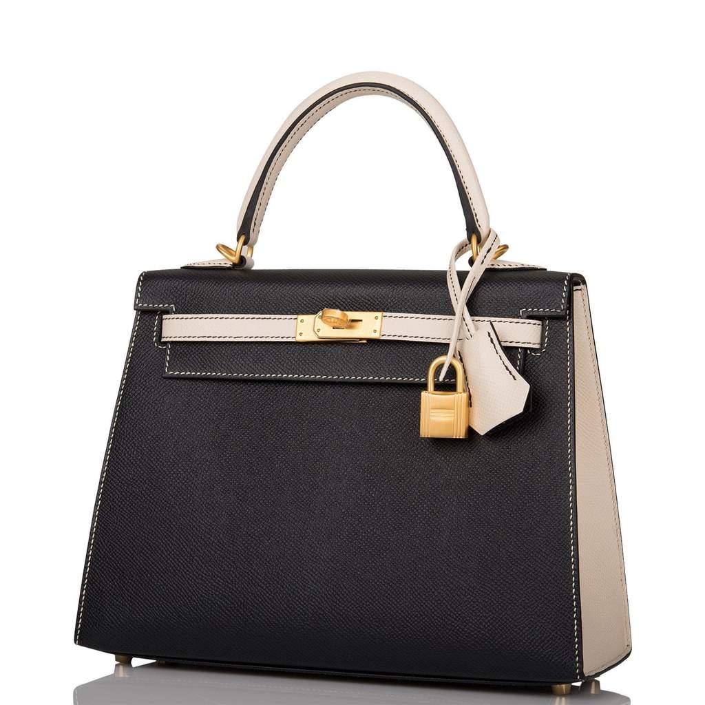 Hermes 

Brand New Kelly 25
HSS Special Order
Black and Craie
So desired!
Sellier 
Epsom Leather 
Contrasting Top Stitching
Brush gold hardware
Removable shoulder strap
Storefresh
One of the prettiest combinations
Striking!
Very Rare
Collection: