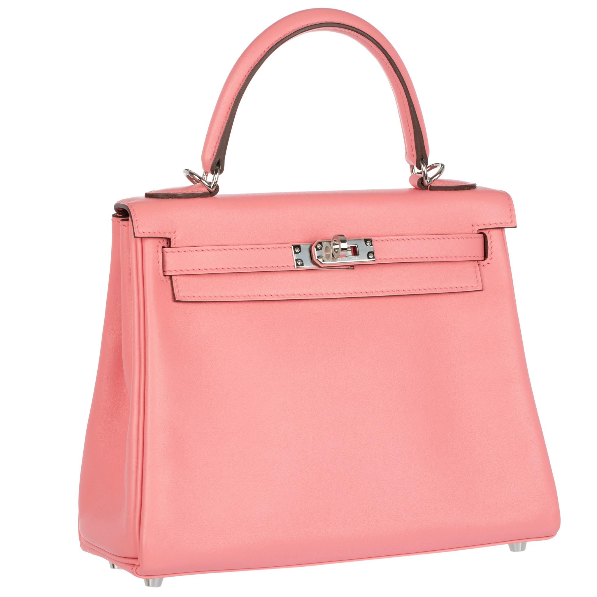 
Brand: Hermes

Product: Kelly Retourne

Size: 25 Cm

Colour: Rose Ete

Material: Swift Leather

Hardware: Palladium

Year: Y 2020

Condition:

Pristine:

The product is in pristine condition, without any signs of wear or damage. It appears brand