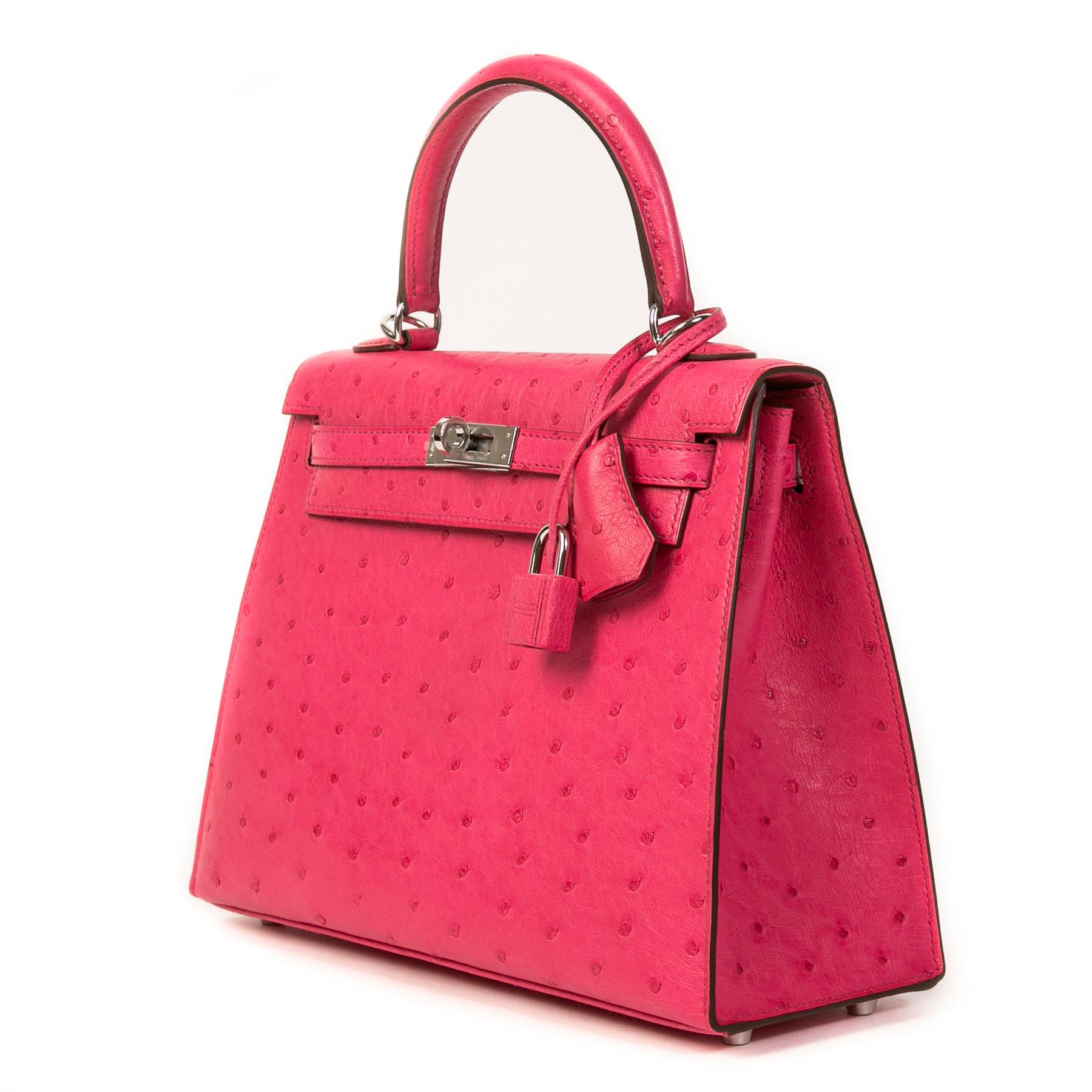 A very rare and exclusive skin and color! The Hermès Kelly is easily world's most coveted and iconic bag every made. This exceptionally beautiful design comes in the size 25 and is crafted out of luxurious Ostrich hide. The color Rose Tyrien can be