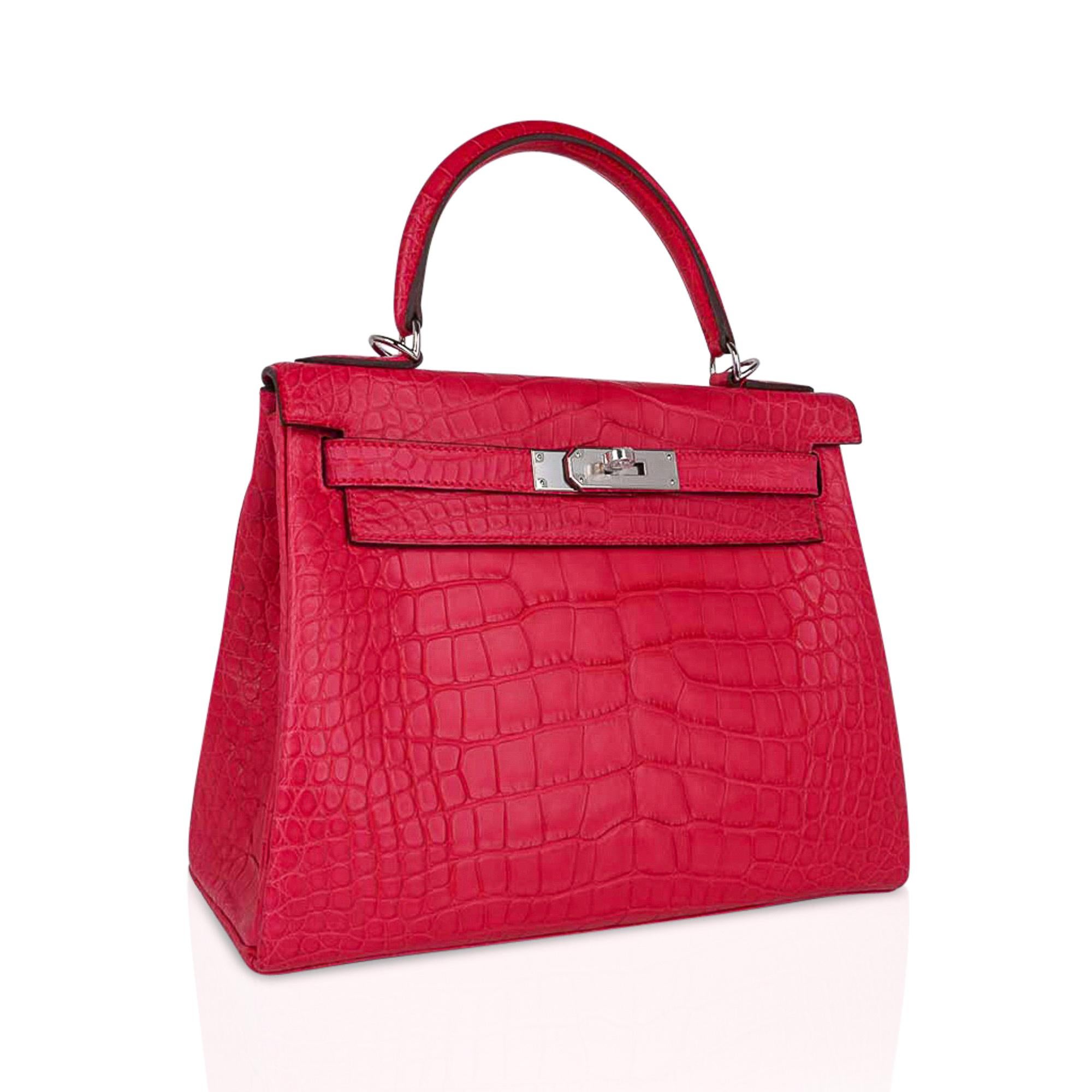 Mightychic offers an Hermes Kelly 28 bag featured in rich jewel toned Rose Extreme matte alligator.
This iconic vibrant pink Hermes bag is timeless and chic.
Fresh with palladium hardware.
This gorgeous Hermes Kelly bag is a perfect year round