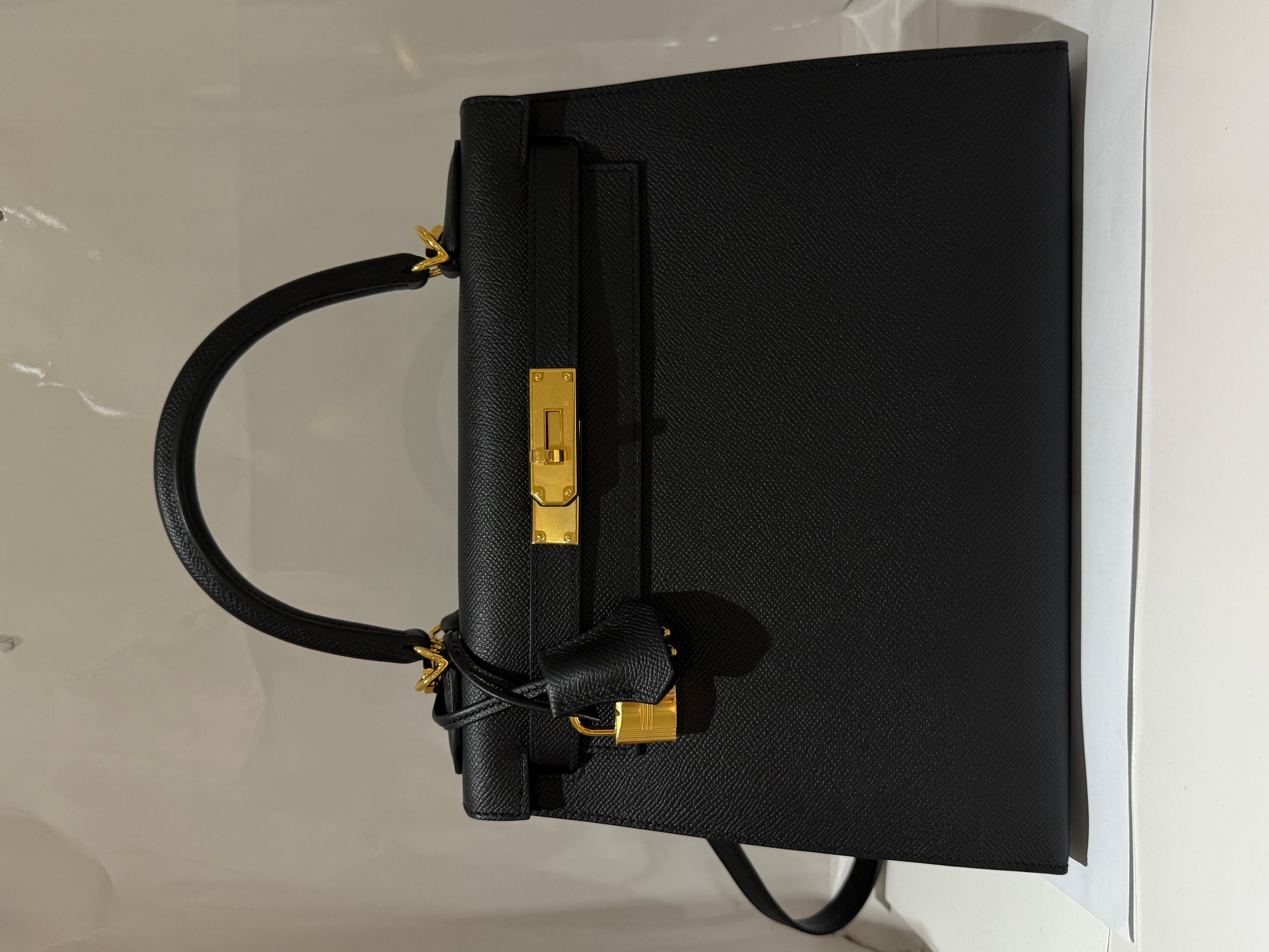 Hermes Kelly 28 Black epsom sellier with gold hardware. The most classic and desirable handbag. All stickers on hardware. Comes with box, dustbag, clochette lock and keys and detachable strap. W stamp 2024. 
