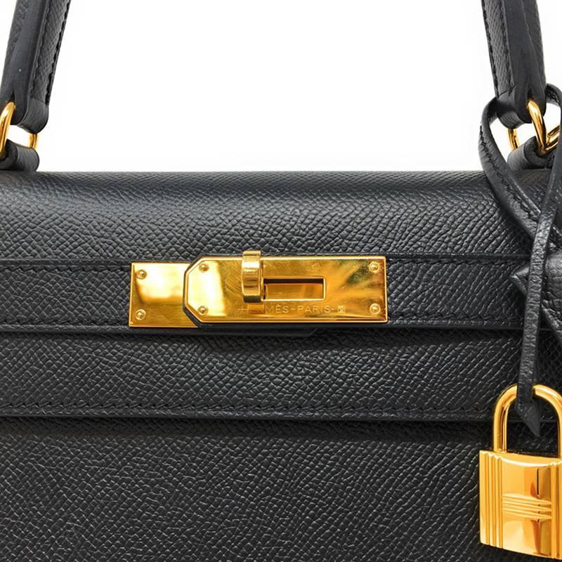 An exquisite Hermes Kelly 28cm in Noir Epsom leather. 
This handbag is the epitome of elegance and style just as the iconic Grace Kelly, Princess of Monaco. 
It is crafted in the Sellier style which will retain it’s structured form. 
The gold plated