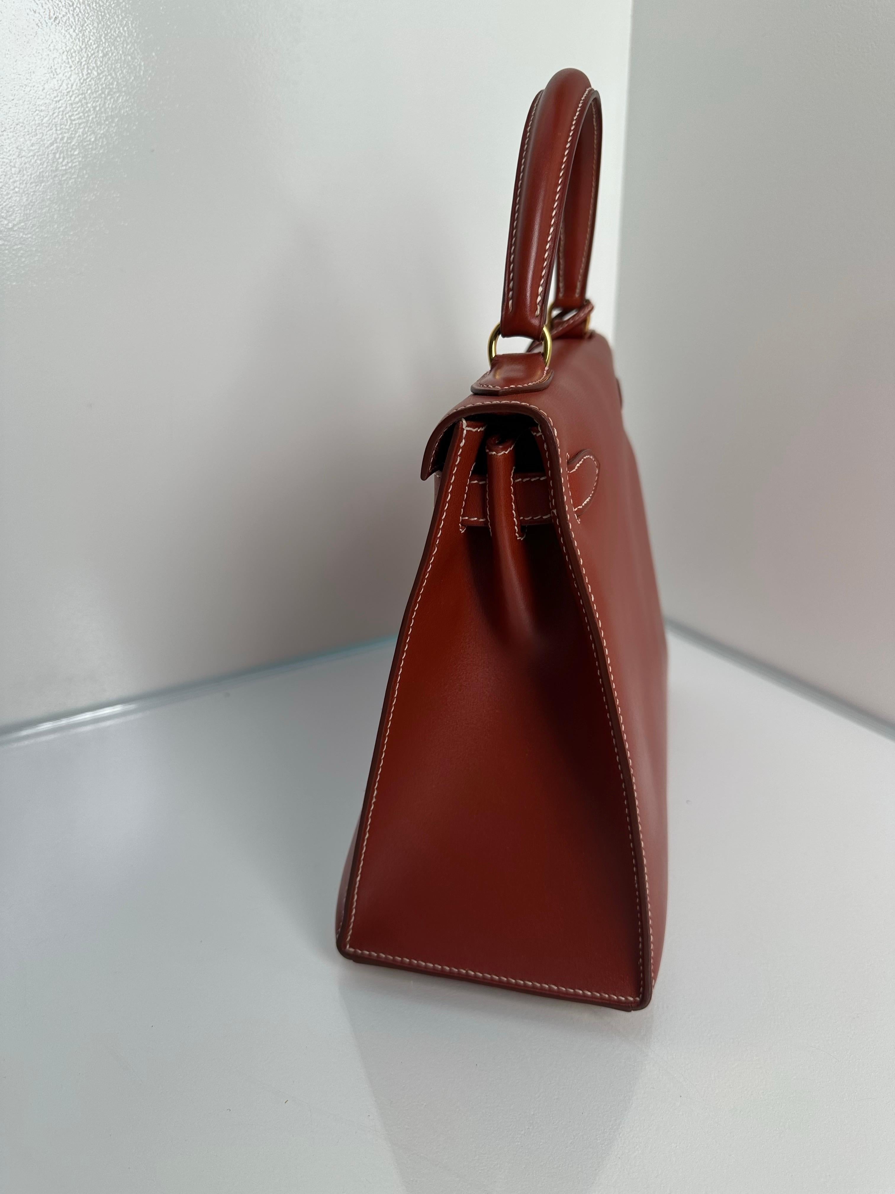 Hermes Brique Kelly 28 Box Leather. Sellier stitching with GHW. Excellent like. Looks like a new bag now. Interior clean. Gorgeous color and great investment bag. Includes clochette, lock, keys, strap dust bag. Guaranteed authentic.