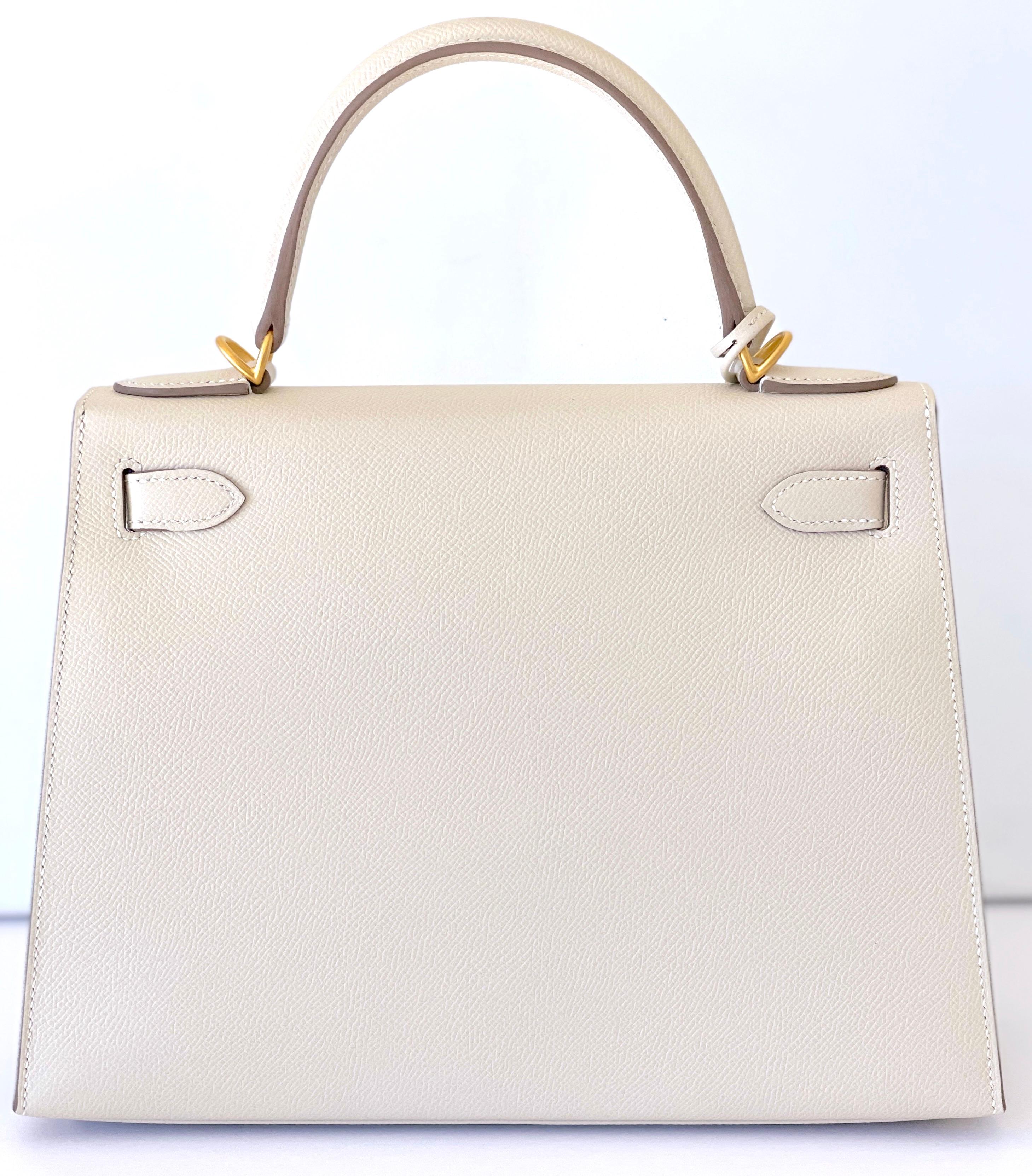 Hermes 28cm Kelly
Hermes Kelly 28cm

Neutral color Craie, a creamy off white
Epsom sellier 
This was a special VIP ORDERED bag
It is stamped with a horseshoe , indicating special order
The hardware is Brushed Gold
Elegance defined
The combination of