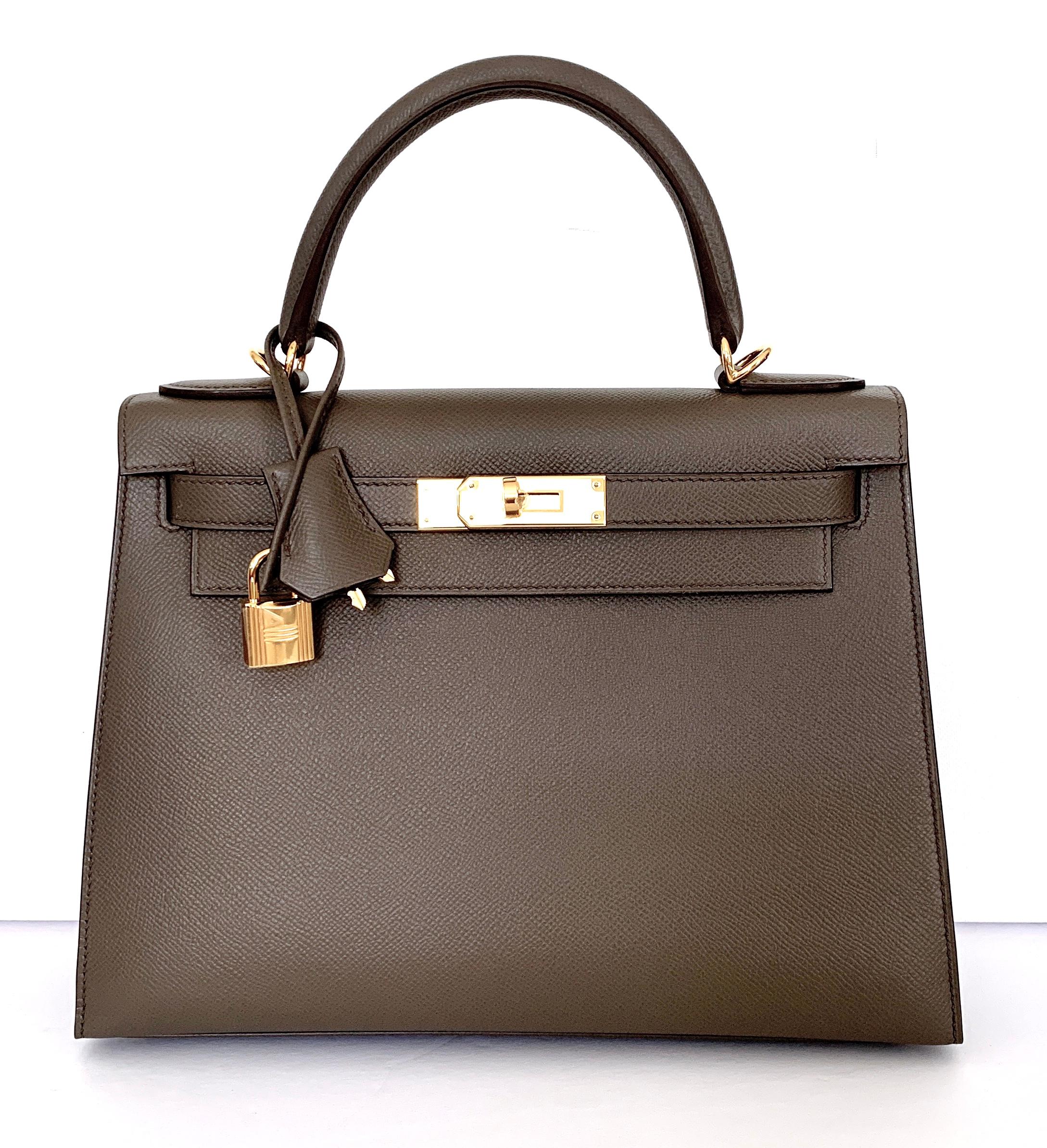 Hermes 28cm Kelly
Hermes Kelly 28cm
Sellier is so desired among collectors!

Neutral color Gris Etain, a lovely Grey
Stunning neutral combination, goes with just about everything

Gold Hardware

Bag is in brand new with plastic on all the