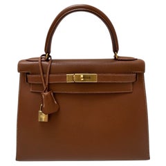 Hermes Kelly 28 Tasche in Gold mit goldenen Beschlägen