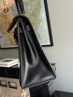 Hermès Kelly 28 handbag in black box calf leather with gold hardware