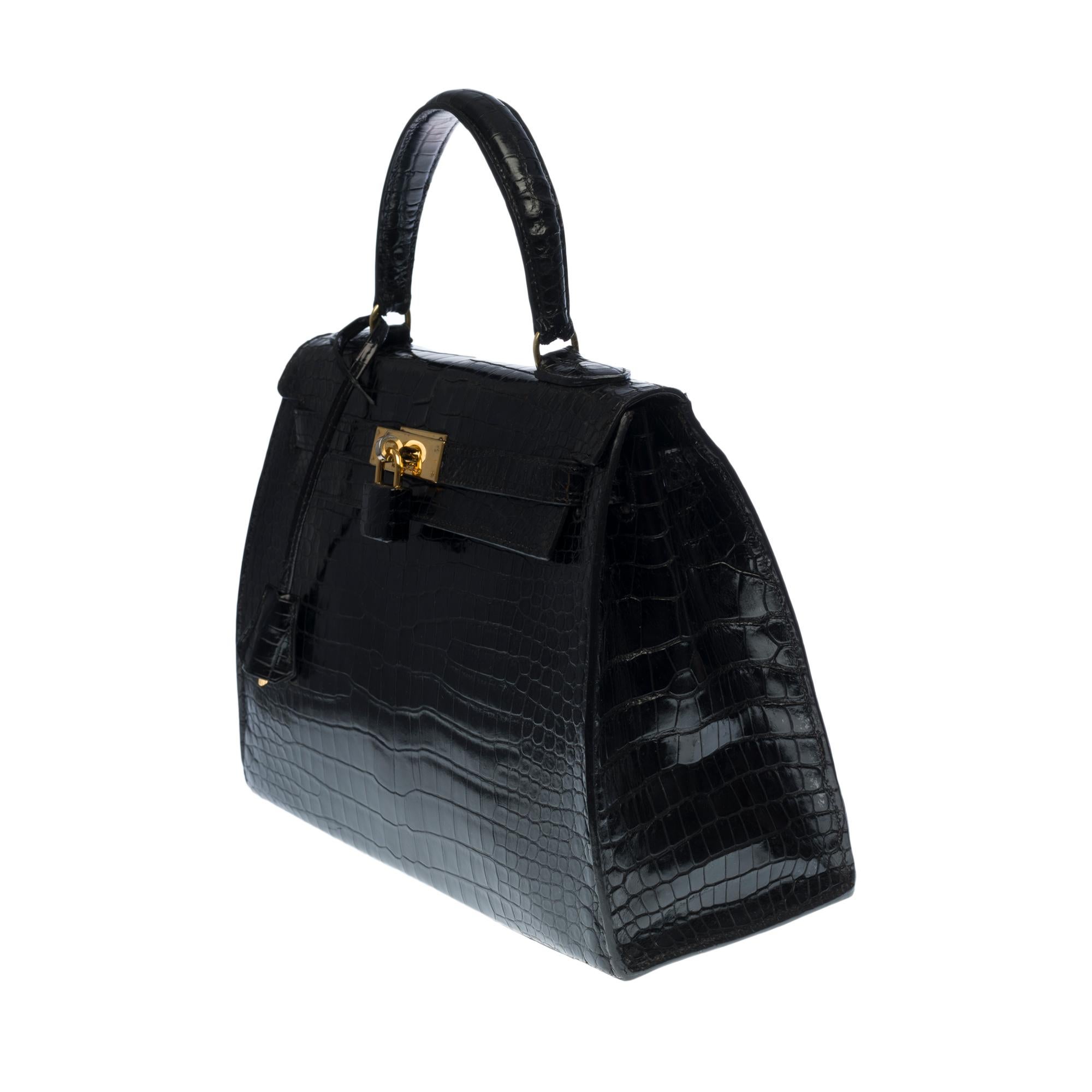 Nero Hermès Kelly 28 con tracolla in pelle di coccodrillo Porosus nera e GHW