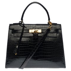 Hermès Kelly 28 Handtasche mit Riemen aus schwarzem Porosus-Krokodilleder und GHW