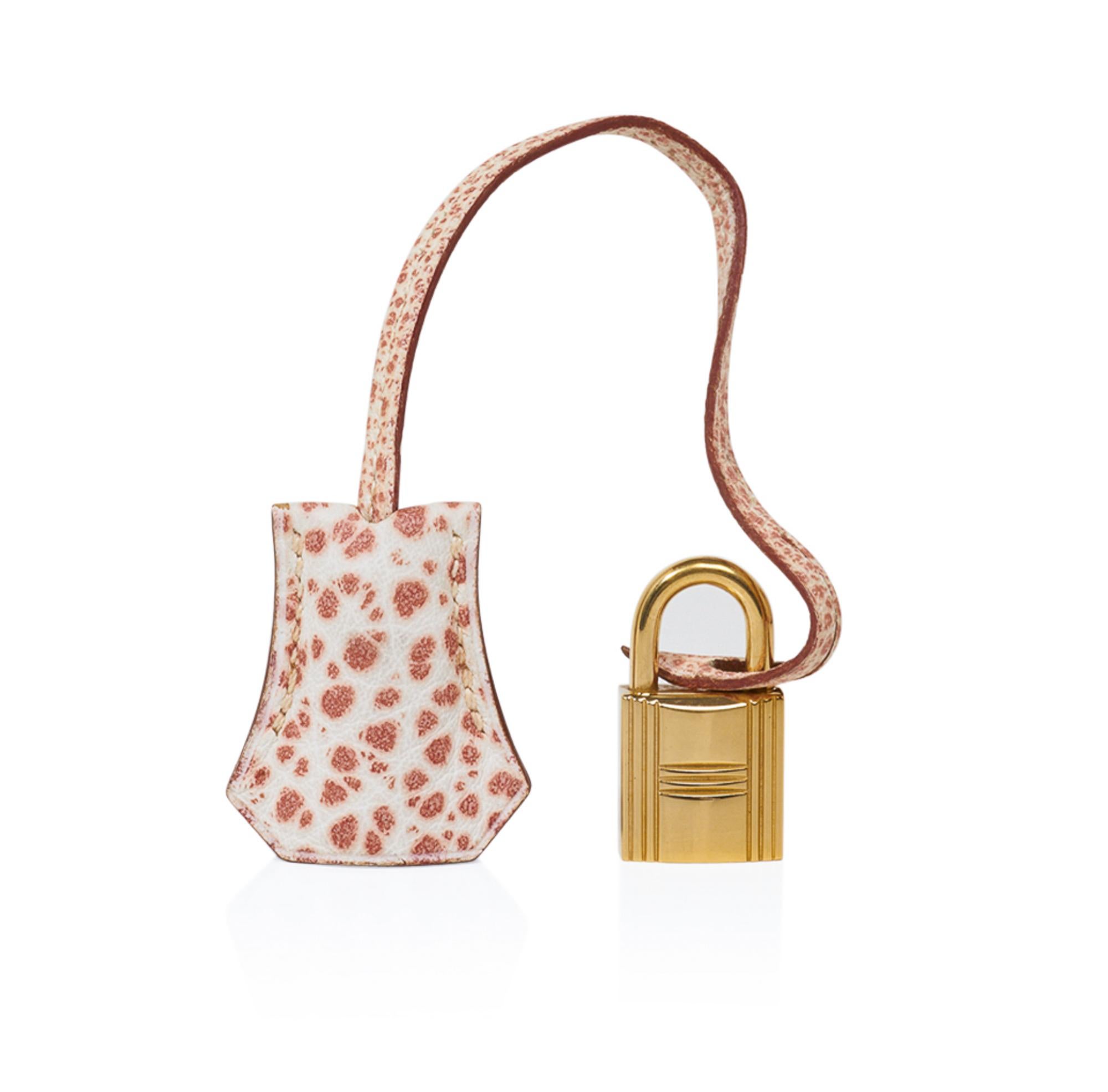 Guaranteed authentic Hermes Kelly 28 bag featured in Pink and White Dalmation Buffalo Skipper leather. 
The exquisite and rare Dalmation Kelly bag was produced in 2008 and only a handful were brought to market in 2010 as it was so difficult to