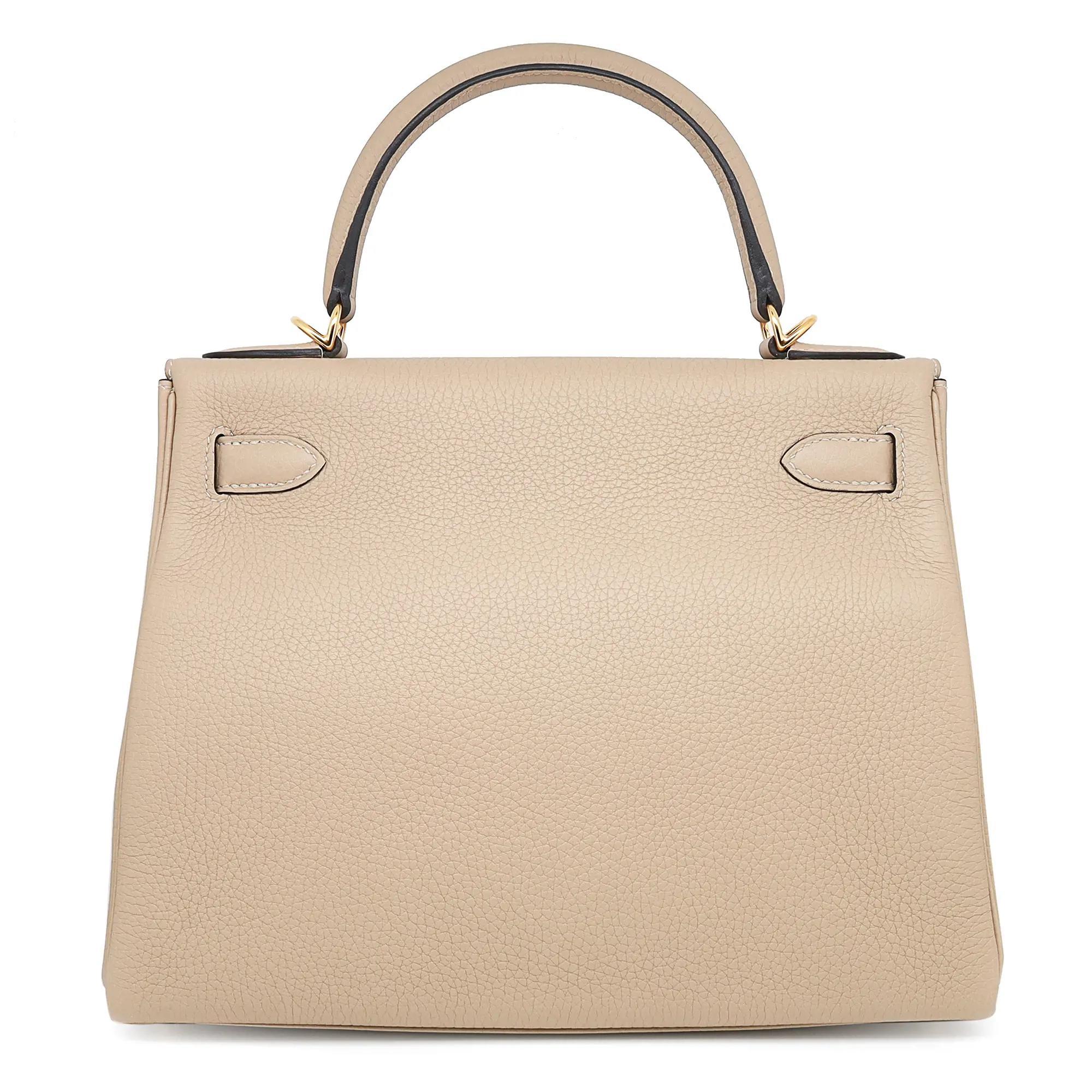 Hermes Kelly 28 Retourne Clemence Trench Gold Hardware Bag This stunning Hermes classic handbag is beautifully crafted in calfskin Clemence Trench leather. Comes with a single rolled leather top handle with a detachable leather shoulder strap. The