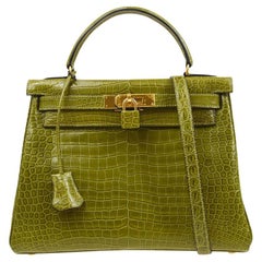 HERMÈS Sac Kelly 28 en cuir exotique vert mat et crocodile Porosus retourné