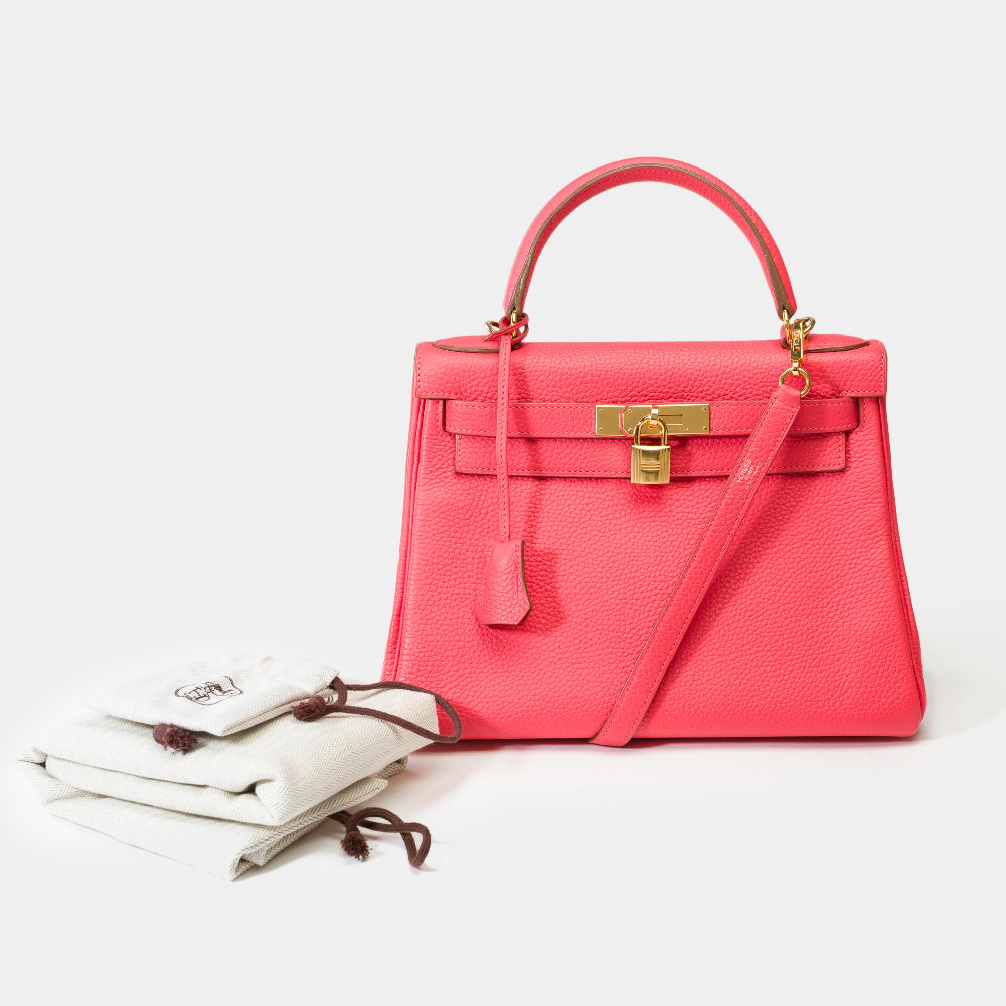 Exceptional​ ​&​ ​Luminous​ ​Hermès​ ​Kelly​ ​28​ ​retourne​ ​handbag​ ​strap​ ​in​ ​Togo​ ​Rose​ ​Lipstick​ ​leather,​ ​gold​ ​plated​ ​metal​ ​trim,​ ​single​ ​handle​ ​in​ ​pink​ ​leather,​ ​removable​ ​strap​ ​in​ ​pink​ ​togo​ ​leather​