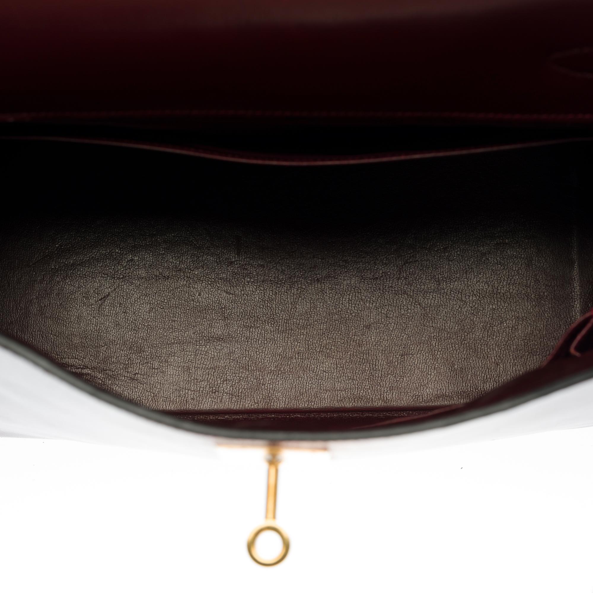 Hermes Kelly 28 retourne handbag strap in Rouge H (Burgundy) box calfskin, GHW In Good Condition In Paris, IDF