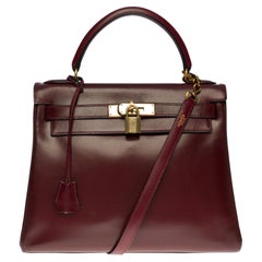 Sac à main Kelly 28 retourné en cuir de veau rouge H (Burgundy), GHW Hermès