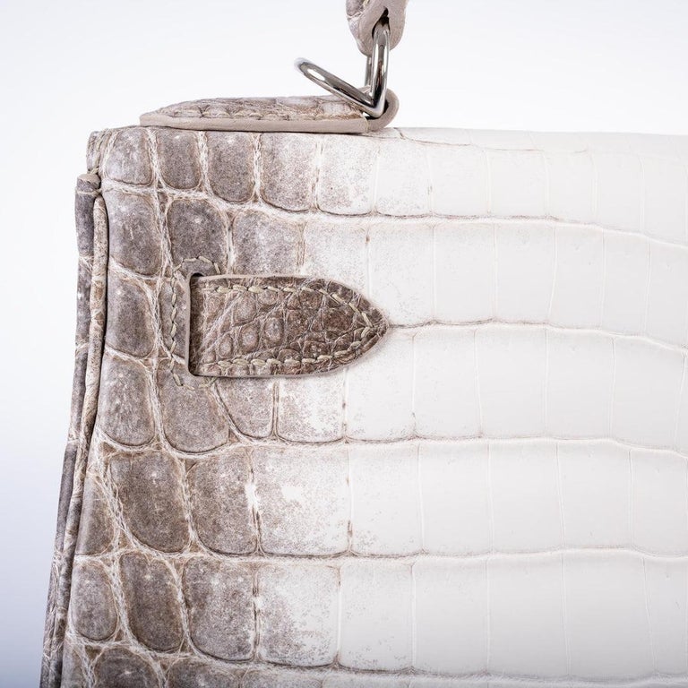 Hermès Kelly Retourne 25 Blanc Himalayan Crocodile Niloticus PHW from 100%  authentic materials!