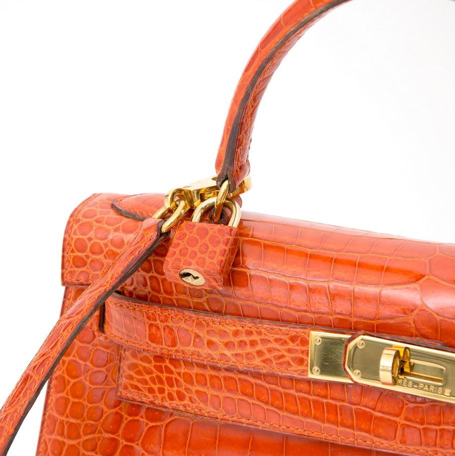 Hermès Kelly 28 Rouge Agathe Crocodile Porosus GHW With Strap In Excellent Condition In Antwerp, BE