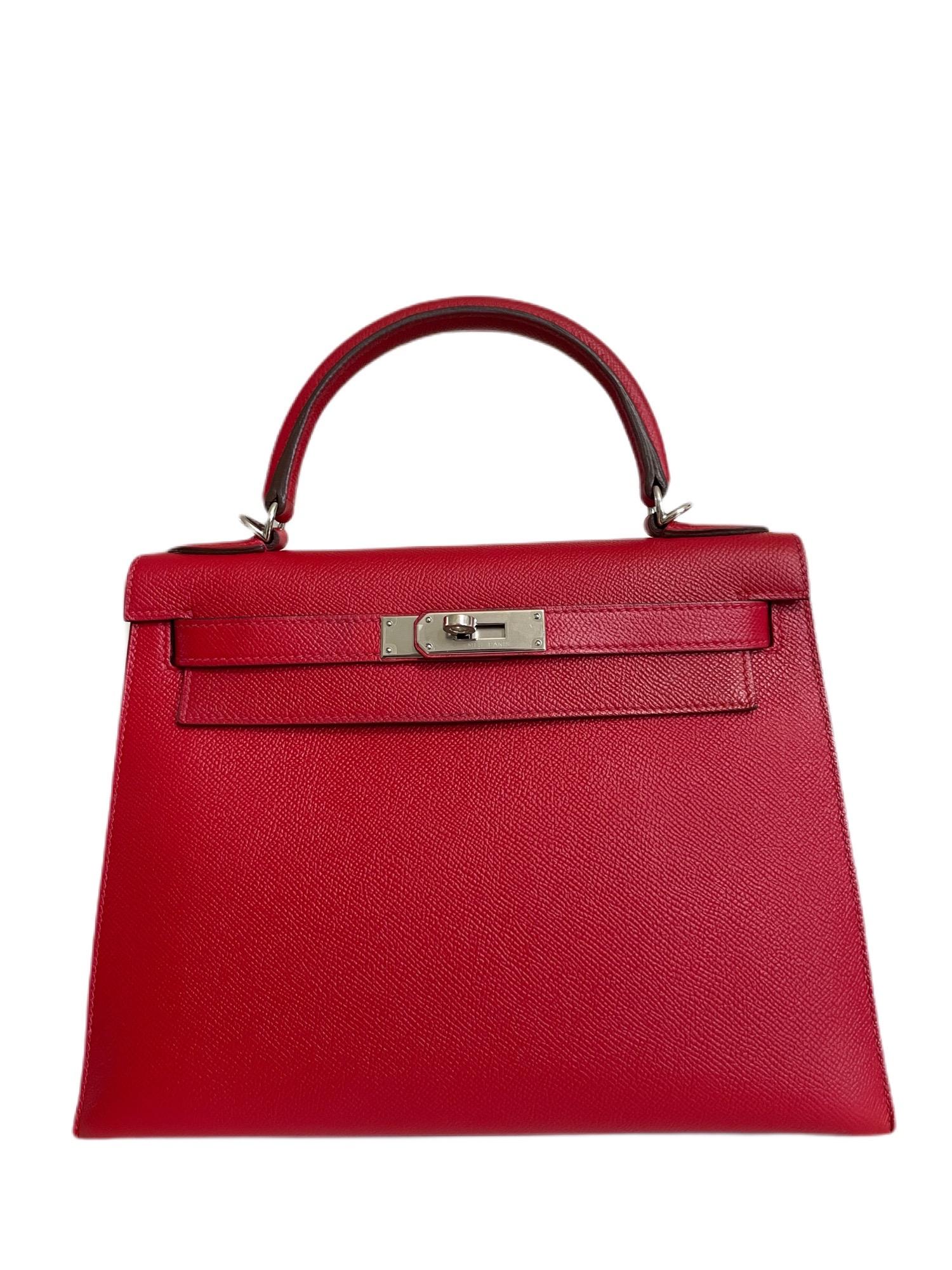 Hermes Kelly 28 Hermes Kelly 28 Rouge Casaque Red Epsom Sellier Palladium Hardware. R stamp 2014. Excellent Pristine Condition, Plastic on hardware, Excellent corners and structure. 

Shop with confidence from Lux Addicts. Authenticity guaranteed! 