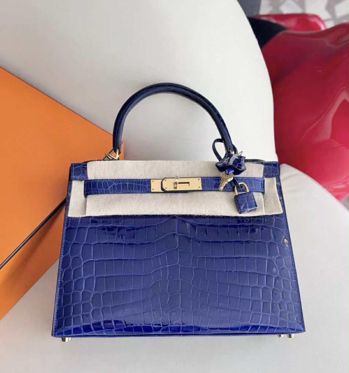 Purple Hermes Kelly 28 Sellier Bleu Electrique Shiny Niloticus Crocodile Bag  with GHW For Sale