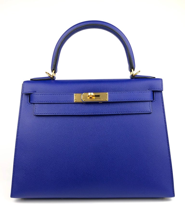 Absolutely Stunning Pristine Almost Like New Hermes Kelly 28 Sellier Blue Electric Epsom Leather complimented by Gold Hardware. Plastic on all hardware and feet. 2018 C Stamp.

Shop with Confidence from Lux Addicts. Authenticity Guaranteed! 