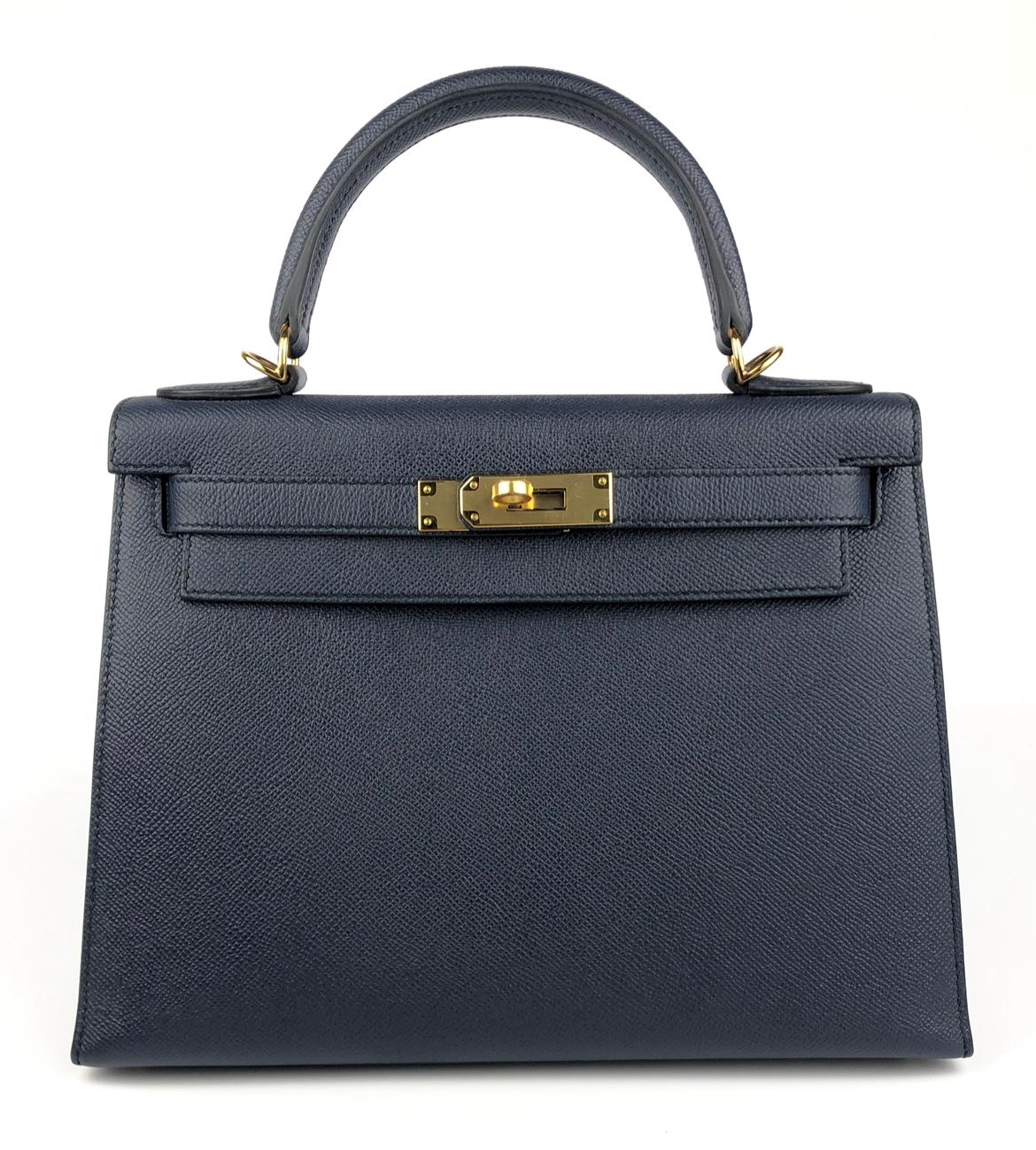 Absolutely Stunning Rare As New Hermes Kelly 28 Sellier Blue Indigo Epsom Leather complimented by Gold Hardware. As New with Plastic on all hardware and feet. 2021 Z Stamp. 

Shop with Confidence from Lux Addicts. Authenticity Guaranteed! 




