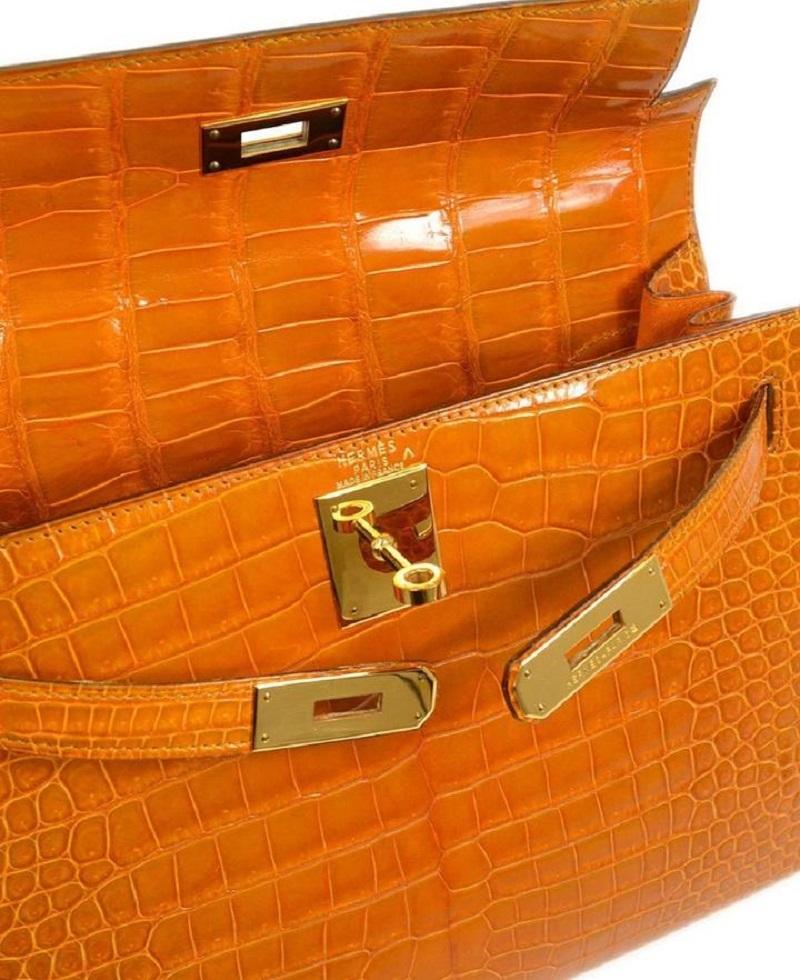 HERMES Kelly 28 Sellier Umhängetasche aus gebranntem Porosus-Krokodil und exotischem Leder (Orange)