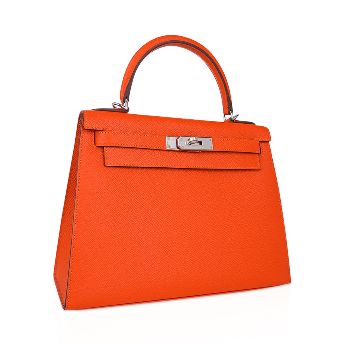 Mightychic offers an Hermes Kelly Sellier 28 bag featured in Feu.
This iconic Hermes Kelly Sellier orange bag is timeless and chic.
Epsom leather is frequently used for saturated colours as it elevates the best hues.
Fresh with palladium