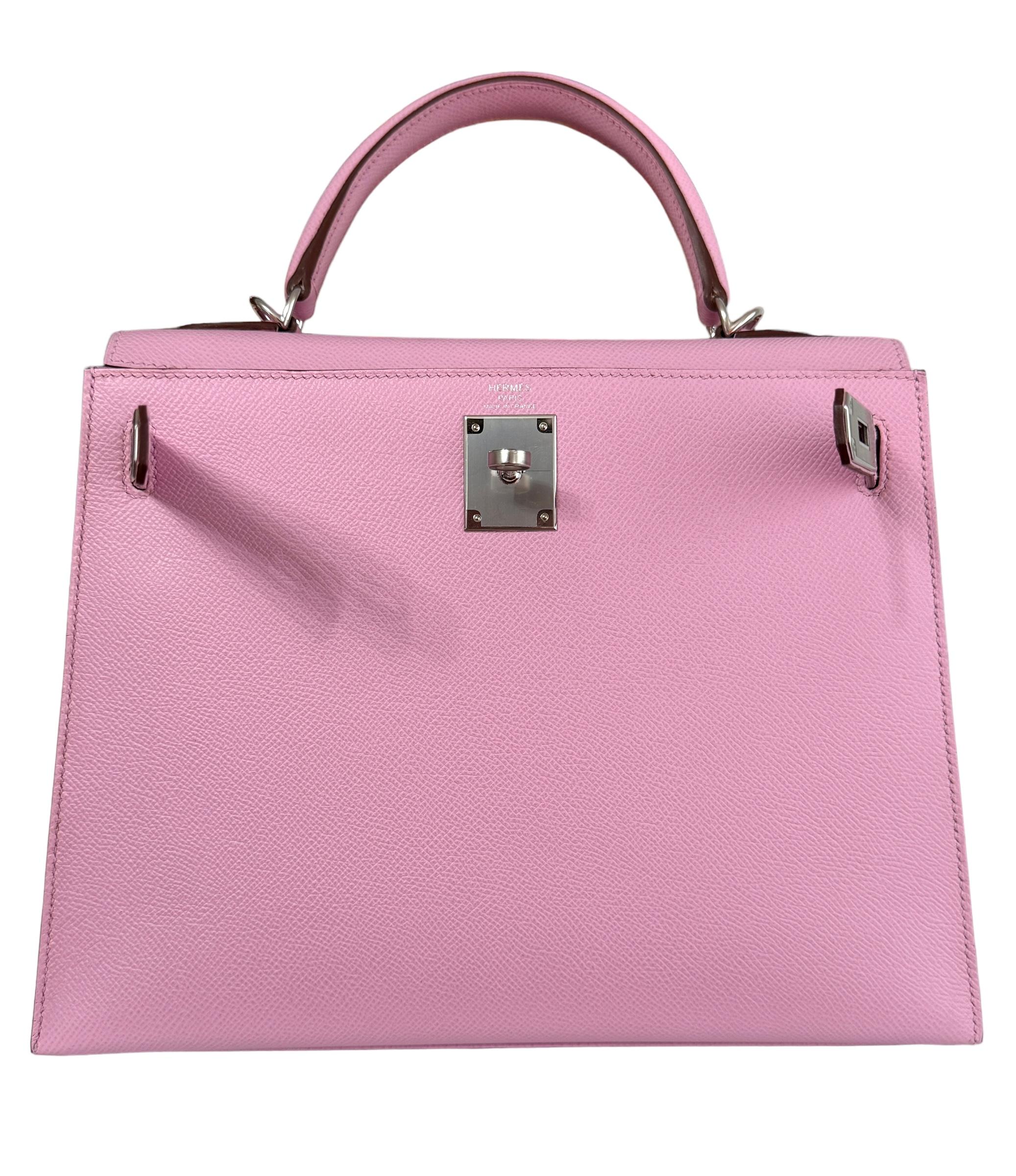 Absolutely Stunning Rare and Most Coveted As New 2022 RARE Hermes Kelly 28 Sellier Mauve Sylvester Epsom Leather , Complimented by Palladium Hardware. AS NEW U STAMP 2022. Includes all accessories and Box. 

Shop with Confidence from Lux Addicts.