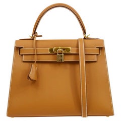 HERMÈS Sac Kelly 28 Sellier en cuir Chamonix brun clair et cognac avec poignée supérieure