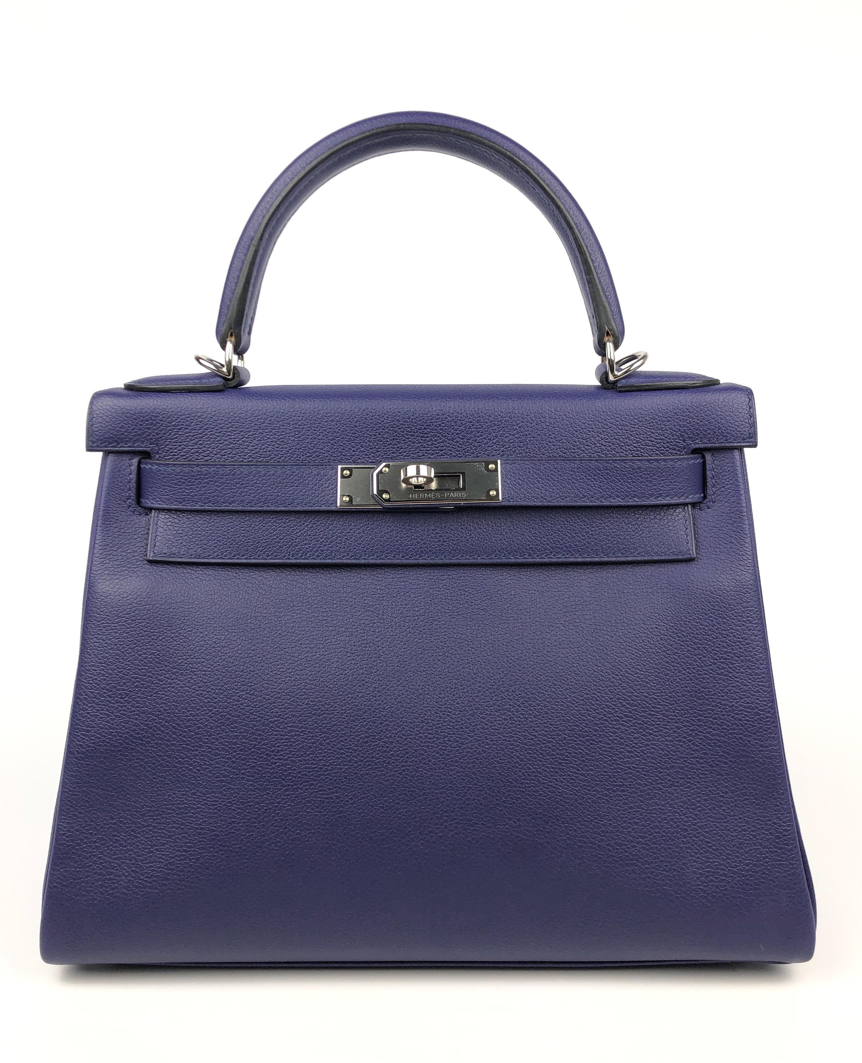 Stunning Hermes Kelly 28 Verso Blue Encre Magnolia Pink Interior Palladium Hardware. Pristine Almost Like New with Plastic on Hardware and some feet. C Stamp 2018. 

Shop with Confidence from Lux Addicts. Authenticity Guaranteed!