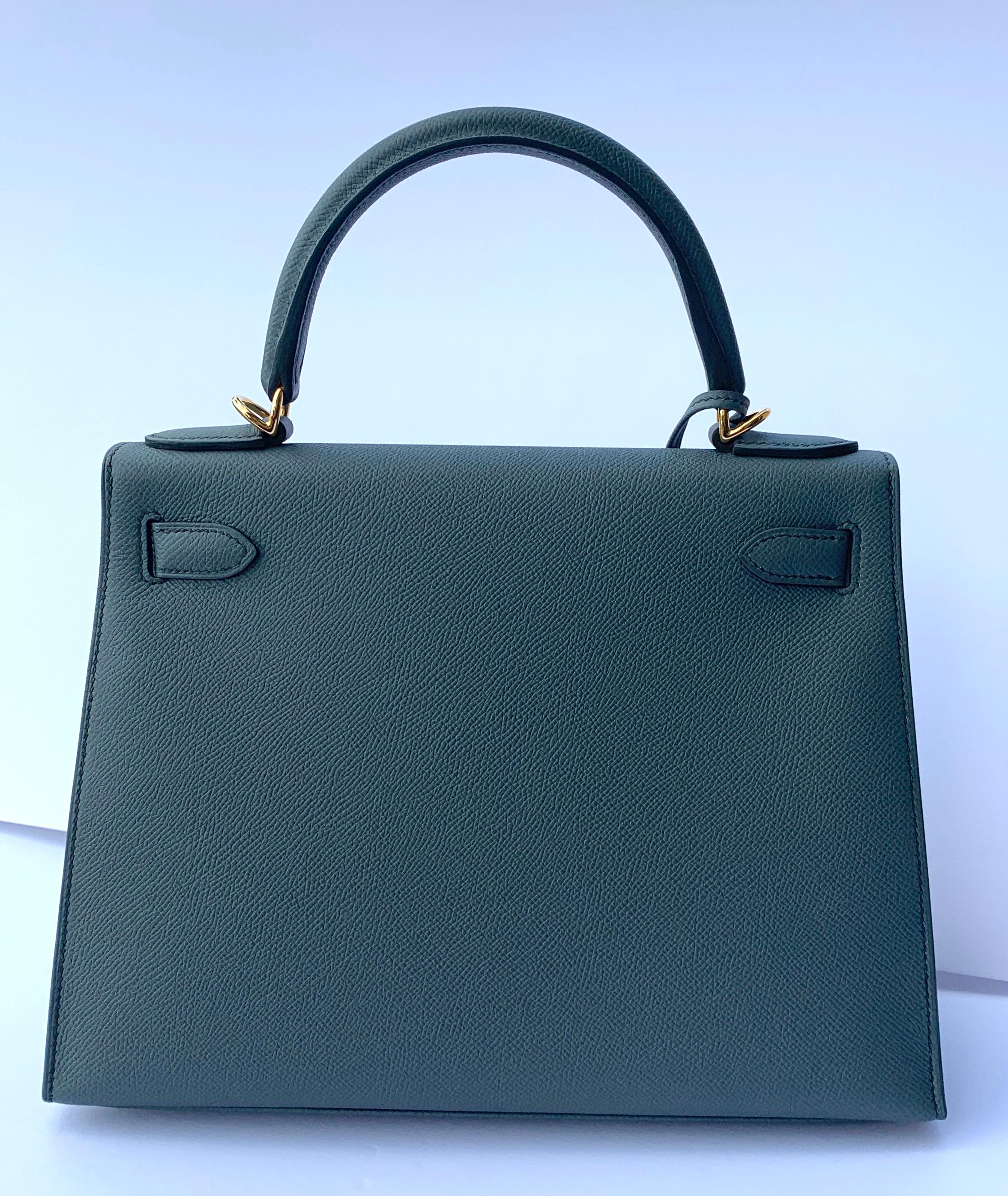 Hermes 28cm Kelly
Hermes Kelly 28cm

A great new neutral color!
Brand new color from Hermes , Vert Amande
Epsom sellier 
The combination is tres chic!

Gold Hardware

Perfect neutral color

Hermes Box, Dustcover, Ribbon, Lock and Keys, Clochette,