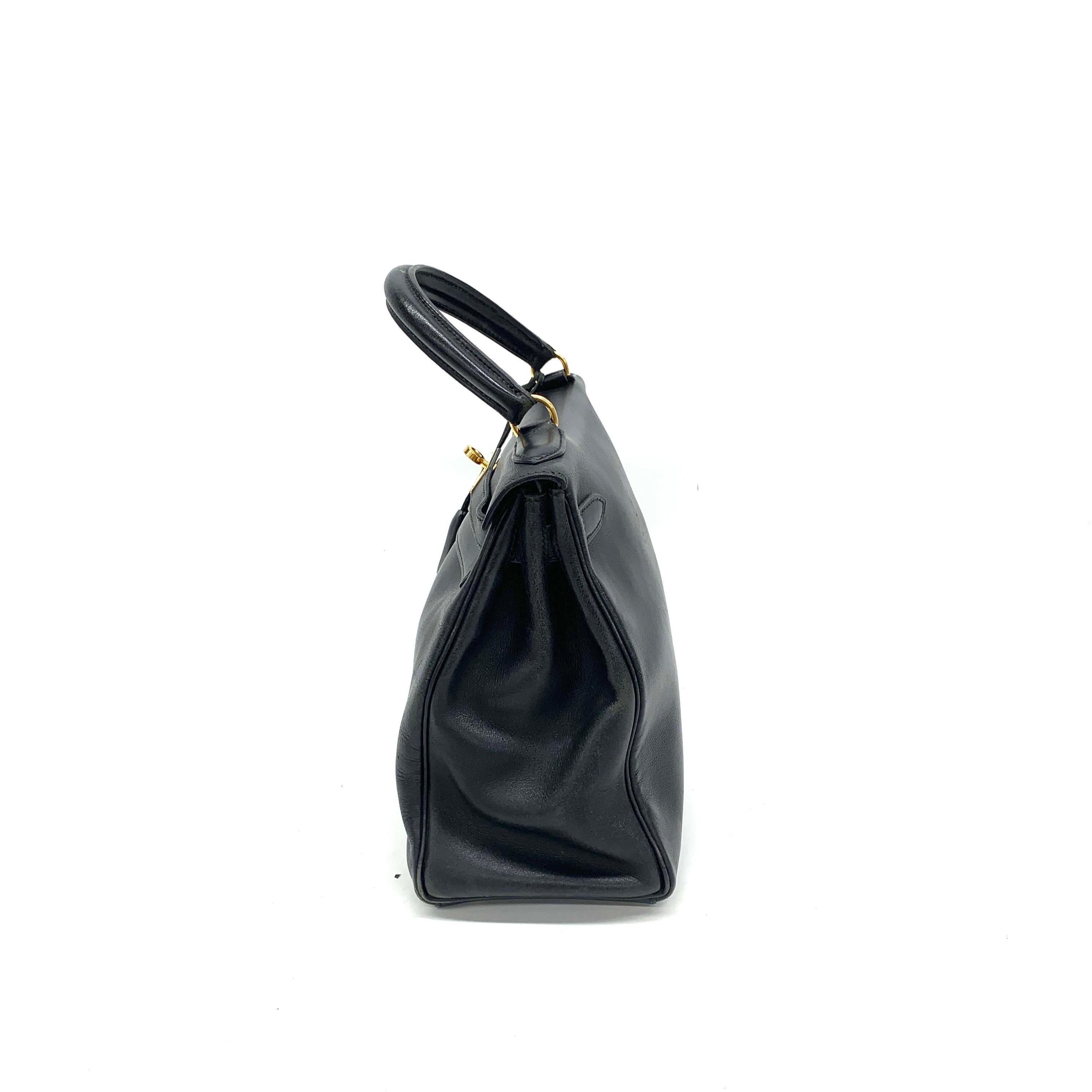 Hermes Kelly 28 Vintage Retourne Black Swift Leather Gold Hardware 1998 In Good Condition For Sale In AUBERVILLIERS, FR