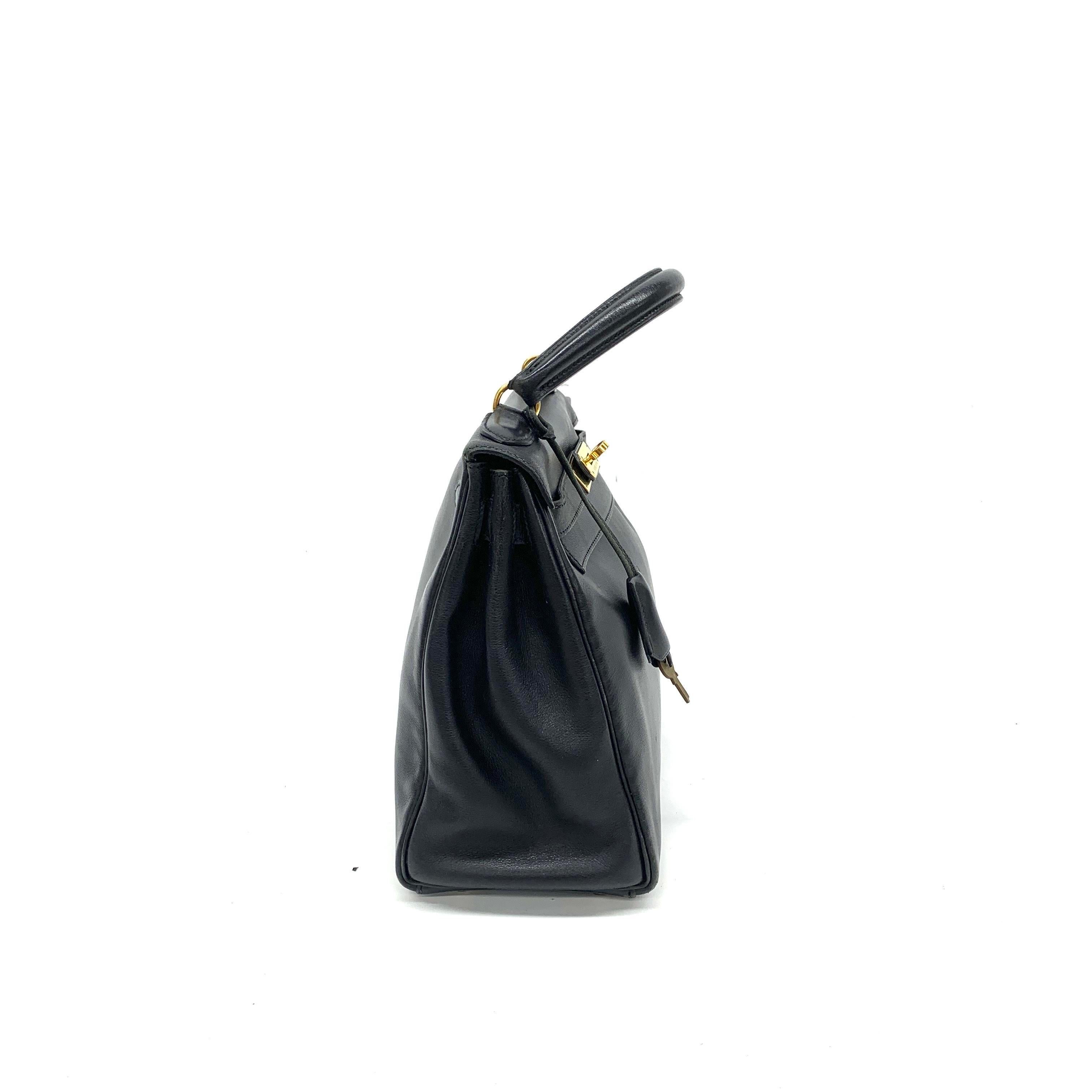 Women's Hermes Kelly 28 Vintage Retourne Black Swift Leather Gold Hardware 1998 For Sale