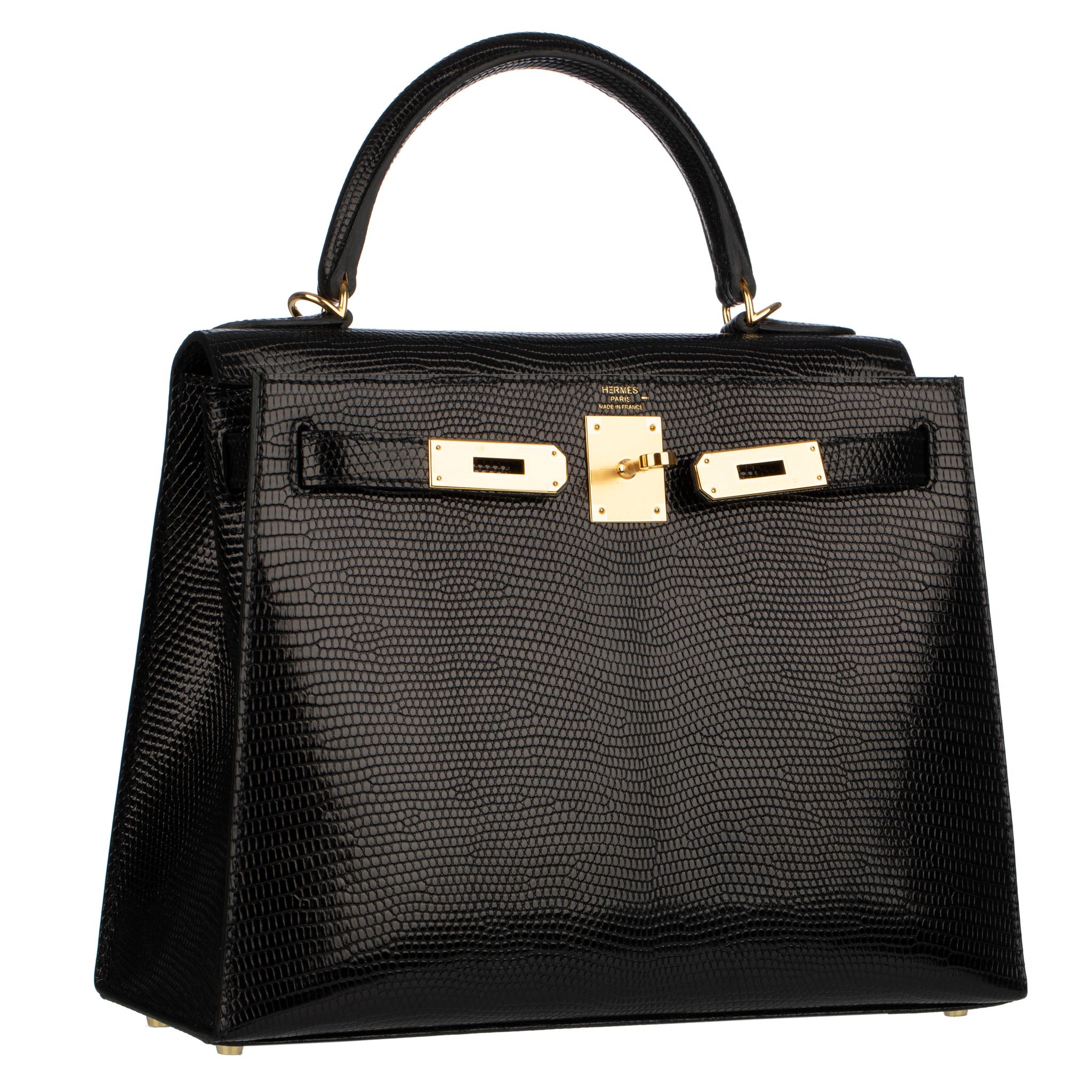 The Hermes Kelly 28cm in Black Lizard Leather with Gold Hardware is an embodiment of unparalleled luxury and sophistication.

Exquisitely crafted by Hermes artisans, this iconic bag showcases the epitome of elegance. The Black Lizard Leather, known