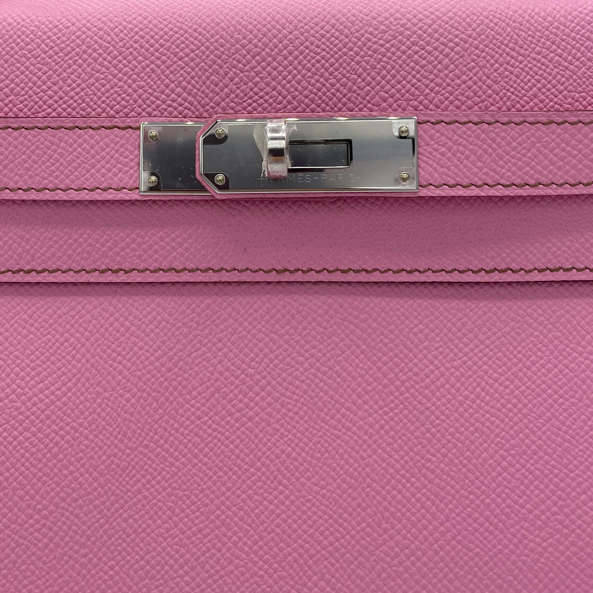 Brand: Hermès 
Style: Kelly Retourne
Size: 28cm
Color: Bubblegum
Leather: Epsom 
Hardware: Palladium
Stamp: 2019 D

Condition: Pristine, never carried: The item has never been carried and is in pristine condition complete with all